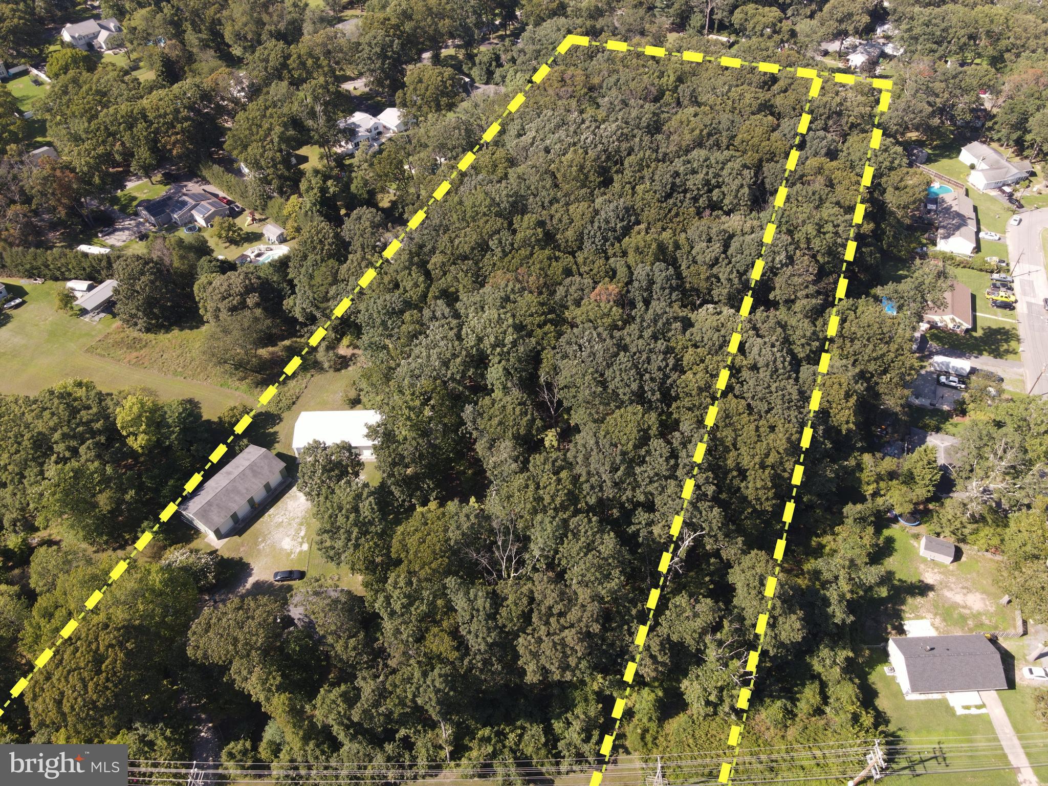 Endless Possibilities on 7+ Acres in Pasadena!
Offered for the first time in over 63 years, this charming 4-bedroom, 2-bath home sits on a combined 7.17 acres across two parcels (Tax ID 020313090093536 included). With over 2,300 sqft including an unfinished basement, this well-maintained family home features a cozy wood-burning fireplace and timeless character throughout.
The true showstoppers are the two massive 1,800 sqft utility buildings, offering a total of eight 10x10 bays—perfect for car collectors, contractors, hobbyists, or business owners. Each building is equipped with 100-amp electric service and a frost-proof hose bib, providing both power and water where you need it. One is a heated block building with oil heat, while the other is a flexible pole building ready for any use.
Zoned R2, this property invites endless opportunities: live in the existing home while exploring subdivision potential, or rent it out and build your dream home on the expansive acreage.
Located in a sought-after Blue Ribbon school district with convenient access to BWI Airport, Washington DC, and Baltimore, this is a rare opportunity to own acreage, utility infrastructure, and location—all in one unbeatable package.