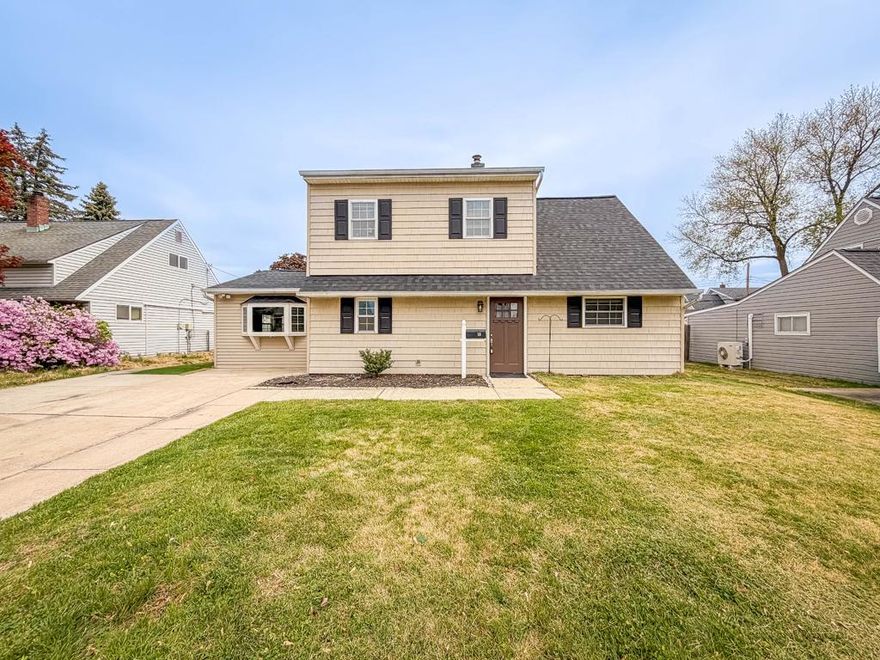 Welcome to this beautifully renovated and expanded TWO-STORY home located in the much sought after neighborhood of Holly Hill. Spacious and open, this home has been completely updated both inside and out. NEW ROOF and tankless hot water system. Newer heat pump, central air, siding, electric and plumbing. The kitchen boasts white Shaker cabinets, stunning granite countertops, and a suite of stainless steel appliances, including a refrigerator, range, dishwasher, and microwave. Newer wood floors throughout the first floor. The large, versatile bonus room can be used as a dining room, family room, playroom or office and  features a large bay window and French doors that open to the backyard. The first level is complete with two bedrooms and an updated full bathroom featuring a walk-in shower. Ascend the staircase to the second floor, where you will find two large additional bedrooms and another spacious updated full bathroom. The home has been thoughtfully updated with newer windows, floors, interior and exterior doors, carpets, recessed lights and ceiling fans. Freshly painted throughout entire home. Outside, a double-wide driveway provides ample parking space complete with an EV charger. The rear yard features a newer vinyl privacy fence, expanded patio with gazebo and a firepit area creating the perfect setting for outdoor gatherings. The newer shed offers convenient storage space for your bikes, tools and equipment. This home truly embodies both style and functionality, making it an ideal place to create lasting memories.
