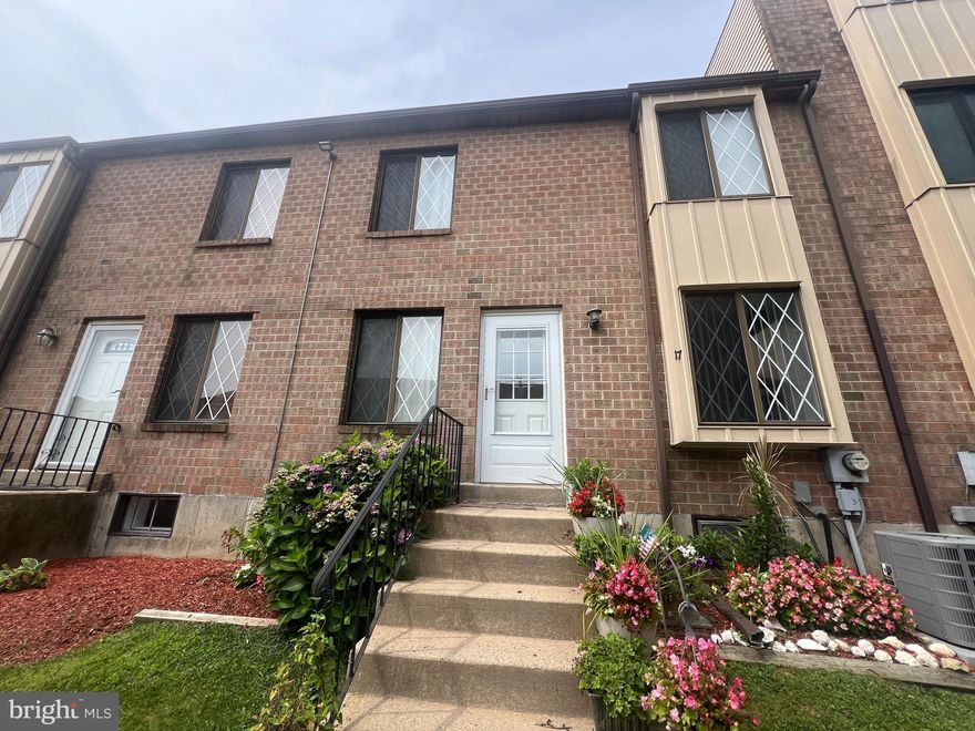 This delightful Colonial-style townhouse, offers a perfect blend of comfort and convenience and is in move in condition. Step inside to the comfy living room an inviting dining/kitchen area, ideal for casual dining and entertaining. The kitchen offers ceramic tile floor granite counters and newer stainless steel appliances. Powder room and convenient laundry complete the first floor. The spacious floor plan features a full finished basement that provides additional living space, including a large family room, a 3rd bedroom and a home office or storage room.
The bathrooms feature modern fixtures and finishes, providing a contemporary touch. The second floor provides a full bath and two spacious bedrooms for relaxation and comfort and great closet space! The home is equipped with new efficient forced air heating and air conditioning, ensuring your comfort year-round. One tv and mount included, one excluded.. This Hilltop community enhances. your lifestyle with amenities such as a  large pool, tennis court, clubhouse, and playground! Brookhaven has a great downtown shopping strip, a fantastic gym and many community events. Only 5 minutes to an I95 exit, 20 minutes to the airport.   Don't miss the chance to make this stunning home yours!