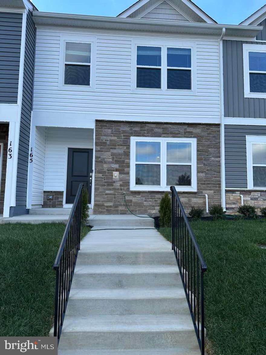 Brand new town house, living here will provide scenic views located near easy commuter routes and plenty of shopping. Open layout with specious kitchen with oversized island is open to family room and dining. Stainless steel appliances with granite countertops in the kitchen. LVP flooring on entire main level. Enjoy beautiful views from the family room.  Three bedrooms on first level with two bathroom. Driveway leads to a car garage.  Available for rent immediately.