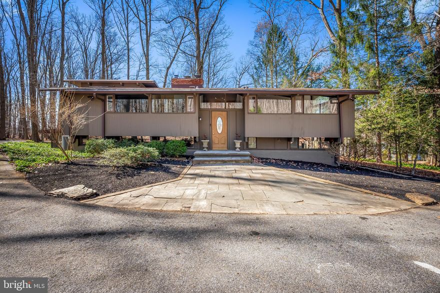 Call this home California style contemporary, a raised deck house, or an homage to the Brady Bunch, it matters not this fine abode has so much to offer * Just over 3000 sq ft nicely sited on 2.44 acres * The rooms are large and spacious and there are so many ways to enjoy this fine home * Lower level for multi generational living  * New floors in warm shade * New primary bath * Upgraded kitchen to include new countertops and appliances * Freshly painted * Vaulted ceilings * Expansive deck * Sitting room off lower level bedroom * So much great space. Beautiful in the springtime and easy to enjoy in all seasons.