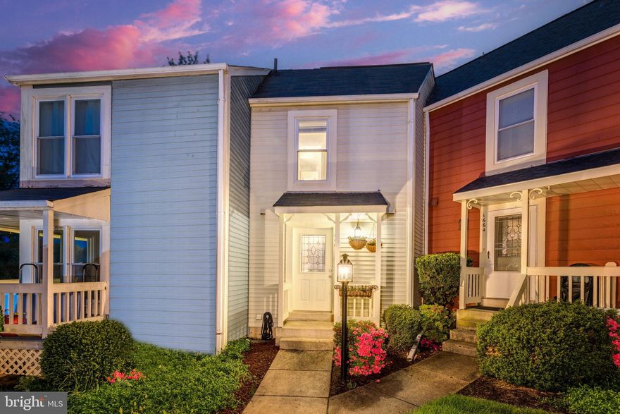 Nestled in a quiet cluster, this charming North Reston townhome is complete with 2 bedrooms, 2.5 baths on three finished levels. On trend paint, updated kitchen, new flooring, and an abundance of windows create instant appeal. The contemporary kitchen is sure to please with gleaming granite countertops, pristine white cabinetry, and an oversized eating bar. The open atmosphere facilitates entertaining during meal preparation and connects well with the quaint family room and cozy fireplace. Ascend the staircase to the light-filled owner's suite which encompasses the entire upper level and boasts a walk-in closet, wood burning fireplace,  and an en suite bath with dual vanity, spa-toned tile, and seamless shower enclosure. The lower level recreation room harbors another large master with en suite bath that open up to the paver patio. All this within walking distance to Trader Joes, the Town Center, and the new future Reston metro. Newer windows, Roof 2015, HVAC 2018.