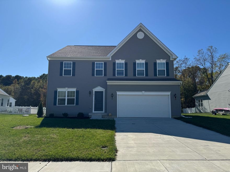 Almost new SFH close to the water! One of the largest models in the neighborhood!! 
Spacious colonial, with 2 car garage, and open concept living area. Main level features 2 bonus rooms, perfect for office, playroom, etc, a half bath, along with a large living space and open concept kitchen, with stainless appliances (gas stove) and granite counters. The upper level boasts 3 nice sized bedrooms, large laundry room with new washer and dryer, and a full bathroom with full-sized walk in shower. The large Primary bedroom features a walk in closet and an En Suite with double vanity and bathtub. Property is steps from the water, pier and boat ramp.  Schedule your showing today!