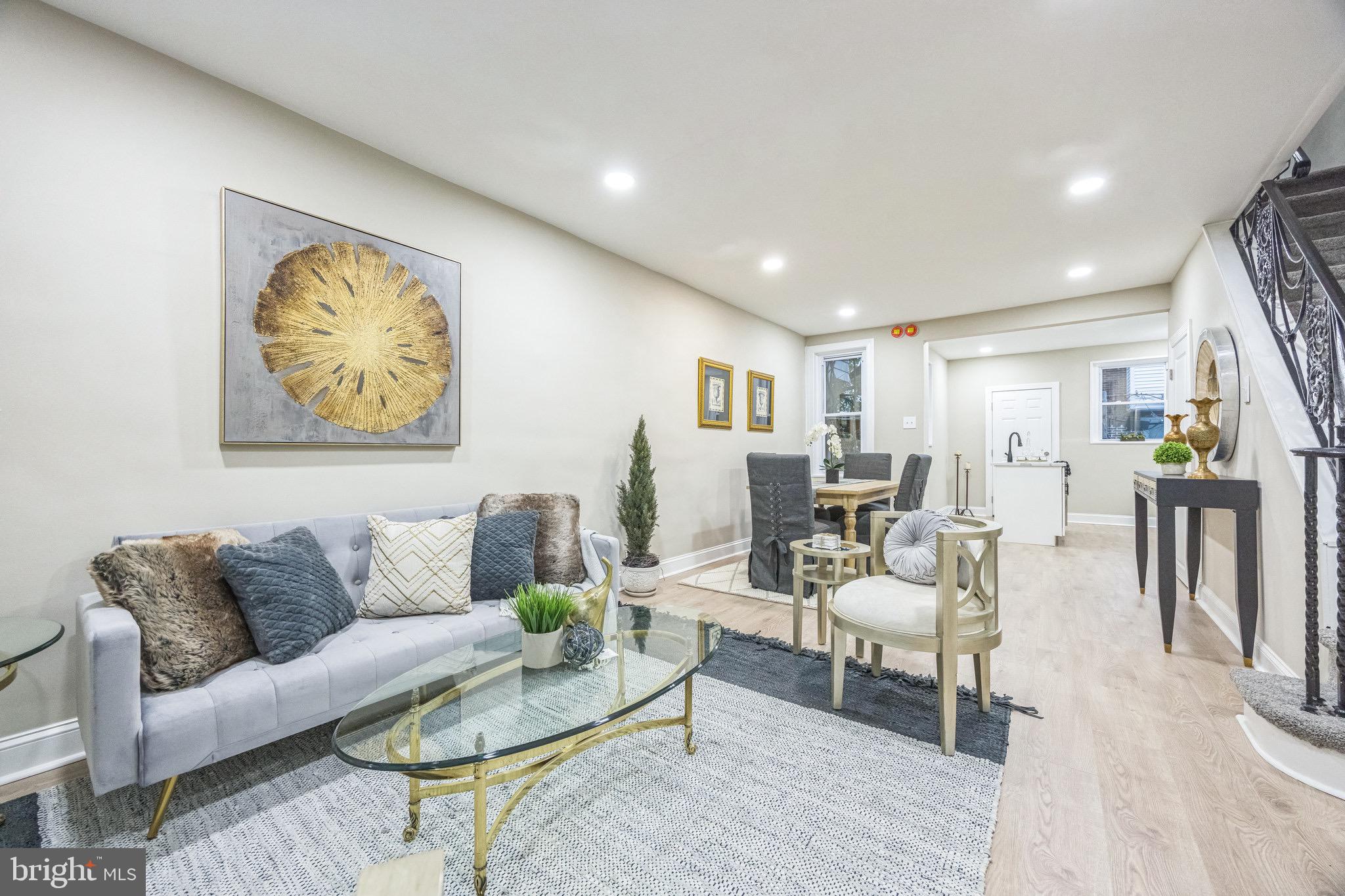 Welcome to this beautifully updated 990- sq. ft. row home in the heart of Olney, Philadelphia! This home has been thoughtfully renovated, combining modern amenities with classic comfort. Step inside to an inviting main floor with new laminate wood flooring that flows seamlessly through the living room, dining area, and kitchen. The fully upgraded kitchen is a chef's delight, featuring stylish white shaker cabinets, sleek stainless steel appliances, granite countertops, and a designer island complete with a built-in sink and dishwasher.
Upstairs, the second floor offers three generously-sized bedrooms, each with plush wall-to-wall carpeting, providing a warm and welcoming space to unwind. The newly renovated full bathroom is fresh and modern, ensuring every inch of this home is ready for its new owner. Don’t miss the chance to own this turnkey home in a fantastic location!