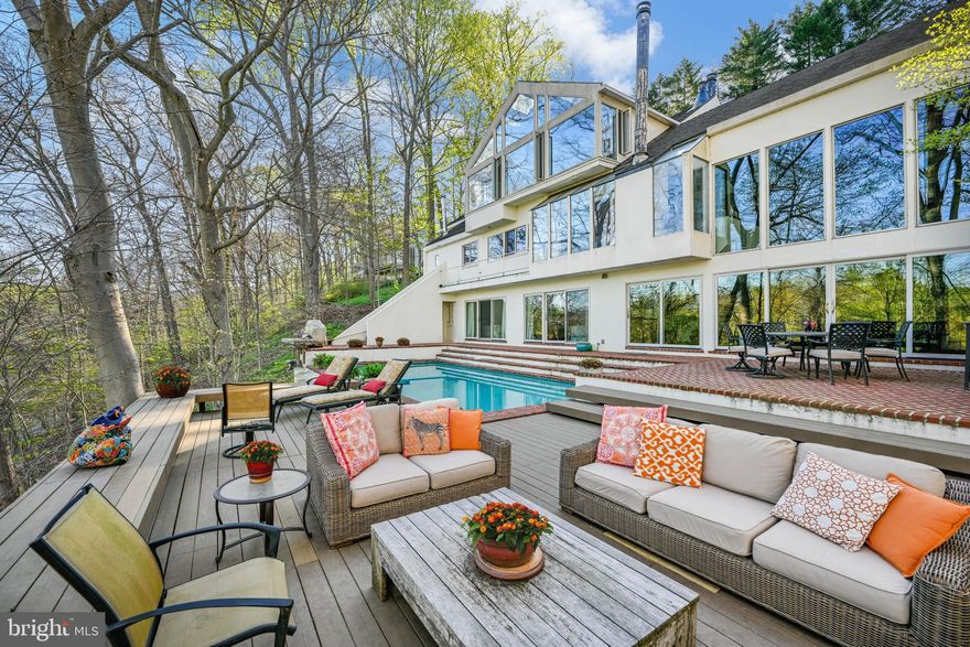 BEST OFFERS IN BY SUNDAY APRIL 28TH MIDNIGHT. SELLERS PREFER NO ESCALATION CLAUSES.

Live authentically. Jimmy Grieves designed iconic contemporary vessel that served as his personal home. Overlooking glistening Lake Roland in all its glory offering sanctuary like privacy.  Prime access to the park and unrivaled water views. Commune with nature as storms roll in and sunsets melt away the day... epic bird watching... live amongst the trees from your glassy perch. Awe-inspiring 2 story great room with patinaed brick floor and expansive wall of glass punctuate the natural splendor. An elevated pool offers the ultimate dip while cocooned in lushly greened privacy. A jaw-dropping owners suite that evokes boutique casita flow...everything you covet on hoilday... brought home.  Open dramatic shower... soaking tub with a view. Reconnect with the joy of getting dressed every day... experience the dressing room of your dreams. Vaulted ceiling... incredible lights... a destination third floor office/exercise space... a home think tank with so many possibilities.  A carefully orchestrated environment can change so much about your living experience and daily rhythms. A rare opportunity to be in the county with awe-inspiring architecture... make it your own. Stamp your aesthetic on this modern masterpiece. Relish the lymph pumping invigorating walks around Lake Roland. Gated drive. Just minutes to Corner Pantry and Whole Foods. Cultivate your existence. The art of uniting human and home.
WHEN YOU VIST FOR SHOWINGS, PLEASE PARK OUTSIDE OF THE GATE AND WALK UP TO THE HOUSE. THANK YOU.