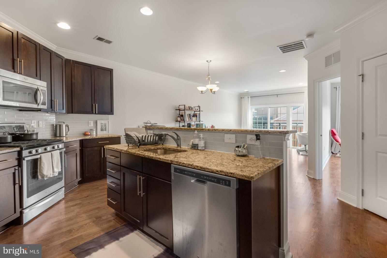 Available Early July:
Welcome to 700 Commodore Ct #2755! This is a rare 1 bedroom, 1 bathroom condo in the Naval Square with 1 assigned off-street parking spot included! Located on the 4th Floor, this fantastic unit features a community outdoor pool, fitness center, in-unit laundry, central air, additional storage space, and modern finishes throughout. You enter into the sun-soaked common area with hardwood floors and recessed lighting that stretch the full length of the space. Your gorgeous kitchen is by the entrance and is equipped with dark cabinetry above and below, granite countertops, white tile backsplash, and a full lineup of high-end stainless steel appliances. To the front is your spacious living area boasting floor-to-ceiling windows and sliding glass doors to a juliette balcony. Continue to your large bedroom with good closet space and abundant sunlight from the juliette balcony. The full bathroom is complete with tile flooring, a granite-topped vanity, and a full sized bathtub/shower combo. A closet hides your stacked washer and dryer and central air ensures comfort all year long. You'll be in a beautiful community with 1 off-street parking spot in a paved lot, an outdoor pool, a fitness center, a storage unit in the garage, and 2 elevators in the building for added convenience. Call today to claim this gem as your own!
Lease Terms:
Generally, 1st month, 12th month, and 1 month security deposit due at, or prior to, lease signing. Other terms may be required by Landlord. $55 application fee per applicant. Pets are conditional on owner's approval and may require a monthly pet rent, if accepted. (Generally, $25/pet/month). Cold water is included. Tenants responsible for: electricity, gas, and cable/internet. Landlord Requirements: Applicants to make 3x the monthly rent in verifiable net income, credit history to be considered (i.e. no active collections), no evictions within the past 4 years, and must have a verifiable rental history with on-time rental payments. Exceptions to this criteria may exist under the law and will be considered.