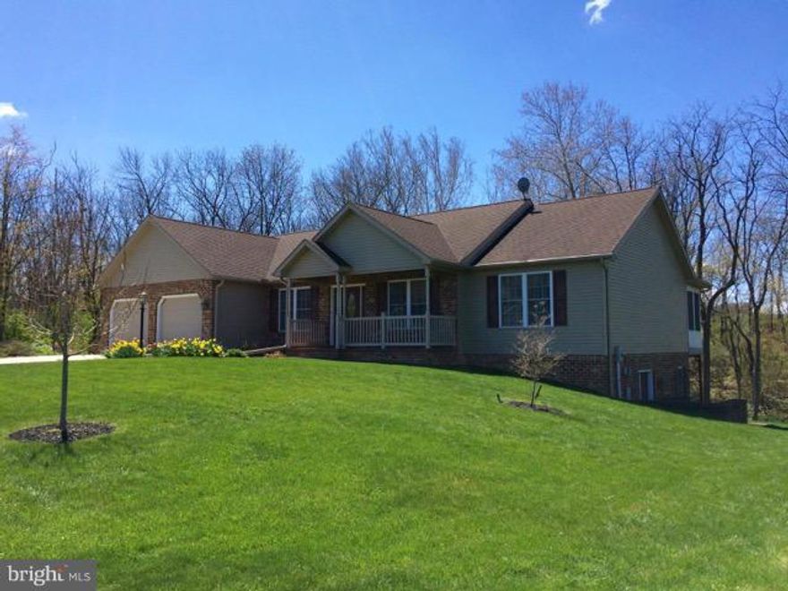 REDUCED TO SELL!!! YOU MUST SEE INSIDE! THE QUALITY OF THIS HOME IS TOP DRAWER! WALK-OUT  BASEMENT COULD BE IN-LAW SUITE, GRANITE/OAK KITCHEN, HARDWOOD FLOORS, 3 FULL AND 1/2 BATHS, LIGHT,BRIGHT INTERIOR, 2 FOUR SEASON ROOMS/DECKS ON MAIN LEVEL, 1 FOUR SEASON ROOM/DECK LOWER LEVEL, WOODED AREA IN REAR IS ON THIS PROPERTY, BRING THE FAMILY!