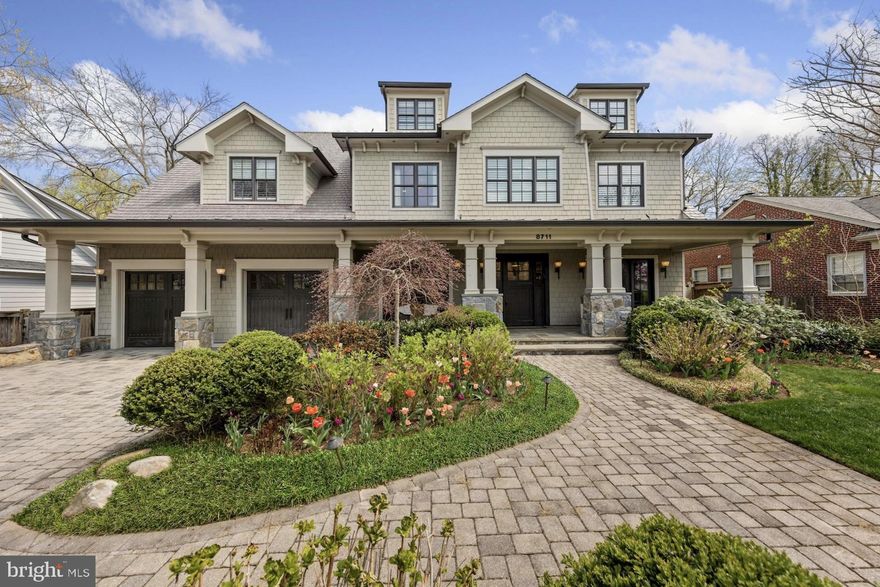 First time on the market! 8711 Ridge Road is a completely custom home built in 2009 by/for the Award Winning Tulacro Developer. This masterpiece residence is located in the Hillmead neighborhood of Bethesda - one of the most sought-after neighborhoods in the Capital Region with luxury homes abound. Steeped in high-end designer finishes throughout, the home exudes class and comfort over every square inch. The total finished footprint spans approximately 9,600+/- square feet on four meticulously finished levels and offers 7 spacious bedroom suites, 7 full baths and 1 half bath. The residence encompasses generous entertaining spaces paired with cozy family living and is flooded with natural light through oversized multiple French doors leading to expansive covered rear patio complete with heat lamps. Architectural details and luxury features include high-end millwork, top of the line fixtures and appliances, installation of state of the art Sonos sound system throughout the home, lower level rec. room with full 2nd kitchen, home gym, and home theater complete with projector, screen and AV hook-up, plus 6 movie theater recliners. Exterior features offer a heated pool with diving board and lighting, electric cover and waterfall feature, planted trees for natural screen from neighbors, in-ground sprinkler system, and landscape lighting. A single entry 2-Car Garage comes with electric car charging outlets. The expert design team behind this custom home has created a seamless masterpiece ready for its next purchaser.