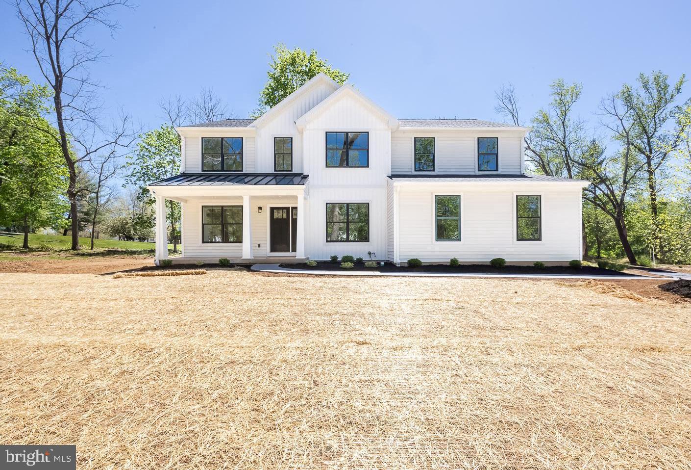 Welcome to 1128 Rapps Dam Rd., a 4 bed, 2.5 bath new construction home offering all the amenities you could need, both inside and out. Located just outside of Phoenixville Borough, enjoy easy access to Routes 23, 113, and all the restaurants, shopping, and outdoor recreation the area has to offer. This home sits on just under a half acre and offers views of French Creek and the Rapps Dam Covered Bridge, which are just seconds away. Cross the bridge and enjoy the trail system and access to all the great outdoor recreation the area has to offer.
Inside, you'll find an open foyer with a private office behind beautiful french doors. Walking further in, you'll enter the large family room with custom trim work surrounding the built in fire place. The kitchen flows naturally from here, featuring an oversize island, wall oven and gas cooktop, and plenty of cabinet and counter space to entertain inside and out. Tucked behind the kitchen is a huge pantry and powder room. This area also accesses the two car attached garage, passing through a mudroom with lockers for an easy way to keep things organized.
Heading upstairs, you'll find a spacious loft central to the house that can serve as an upstairs living room, quiet study area, or anything in between. Three generously sized secondary bedrooms branch off this space, as well as the upstairs hall bath and laundry area. The owner's suite features plenty of space as well as an attached full bath and walk in closet. The owner's bath includes a walk-in tile shower behind a frameless glass door, double bowl vanities, and a soaking tub that looks out into the back yard and down toward French Creek.
The full sized unfinished basement is pre-plumbed for a full bath and covers the full footprint of the home, providing plenty of space for storage or to grow the home.Listing Agent John Lentz is an owner and member of MCH Development LLC, the builder and owner.