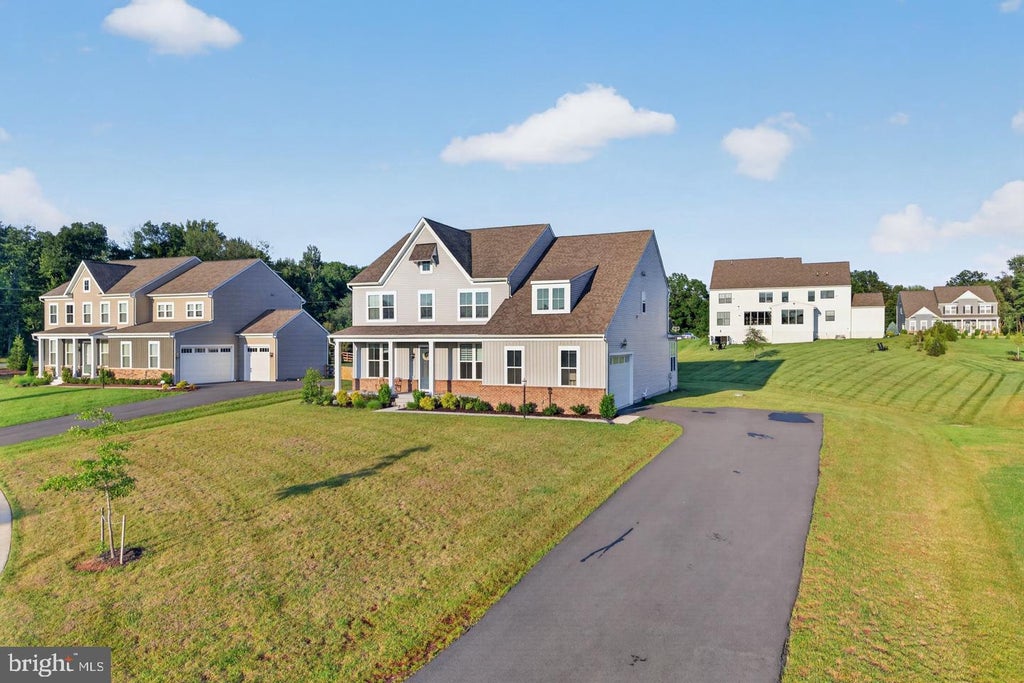 Photo of 7305 Sugar Magnolia Loop, GAINESVILLE, VA 20155 (MLS # VAPW2127904)