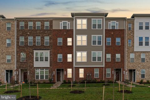 Photo of 138 Matisse Place #1003G, BOWIE, MD 20716 (MLS # MDPG2181176)