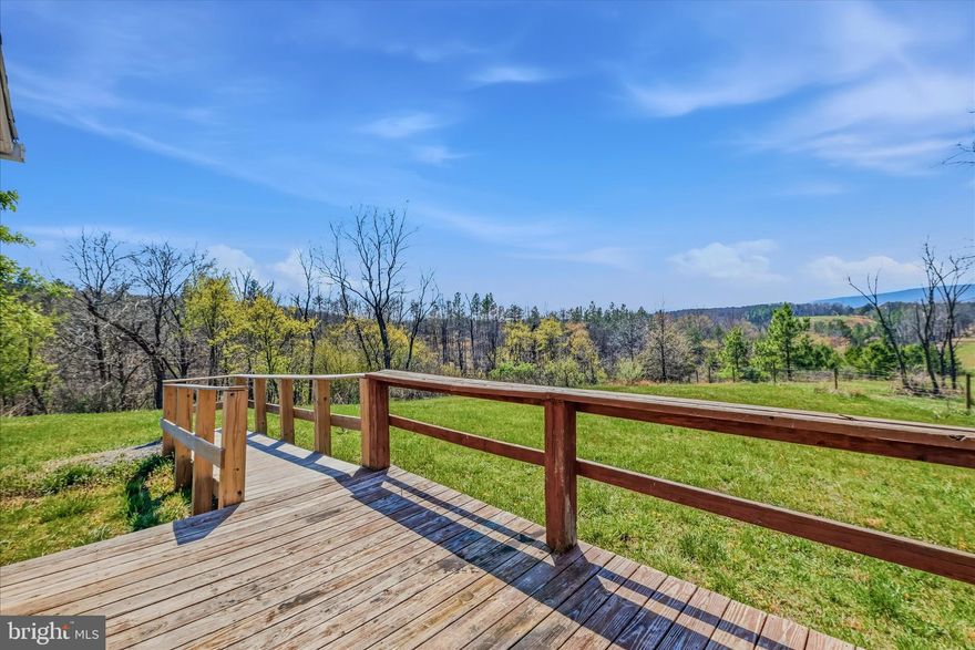 Mountain views for days! This 3-bedroom, 2-bath home sits on 2 scenic acres in Berkeley Springs and offers the peaceful country lifestyle buyers love. Enjoy breathtaking sunsets, open skies, and privacy while still being just minutes from the historic town of Berkeley Springs. The property provides the perfect setting for a full-time residence, weekend getaway, or mountain retreat. Being Sold AS-IS.