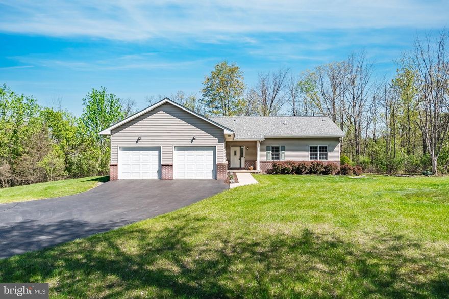 MULTIPLE OFFERS RECEIVED. HIGHEST & BEST DUE SUNDAY 5/4 BY NOON. Get ready to fall in love with this meticulously maintained ranch home, situated on nearly 3 acres in the heart of Coopersburg and Southern Lehigh School District. This charming 3 (possible 4) bedroom, 2 bath home features convenient one-floor living with beautiful views, eat-in kitchen with full table space, living room with propane gas fireplace and the convenience of main floor laundry. The primary bedroom suite features vinyl floors, a walk-in shower, single vanity with Moen fixtures and a private water closet with pocket door entrance. The finished basement offers an additional 1,275 of living space with family room, bedroom, ready to finished bathroom, additional storage space and walk out. The rear yard is an absolute sanctuary with mature shade trees and Trex deck. This home is a rare find in a sought-after location, providing a unique opportunity to enjoy the beauty and charm of Upper Saucon Township. Don’t miss the chance to make this cherished home your own!