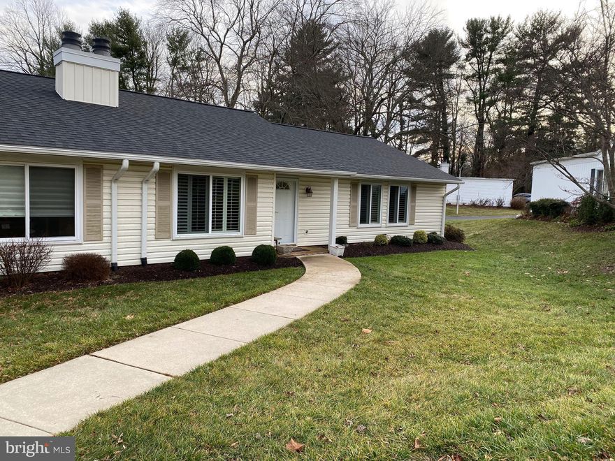 Beautifully remodeled 3 bedroom, 2 bath patio home in over 55 senior living community. Long, wide driveway for 2+ cars.   Garage has been finished into a huge, bright family room offering hardwood floors, plantation blinds, 2 ceiling fans and a wall of closets.  Crown molding and panelled doors throughout home.  Luxury vinyl plank and new carpet.  Freshly painted in neutral colors.  Remodeled kitchen with corian counters, recessed lighting, tiled backsplash and roll out trays.  Both bathrooms remodeled with Kohler toilets, beautiful vanities and new lighting fixtures.  This one offers a ton of living space!