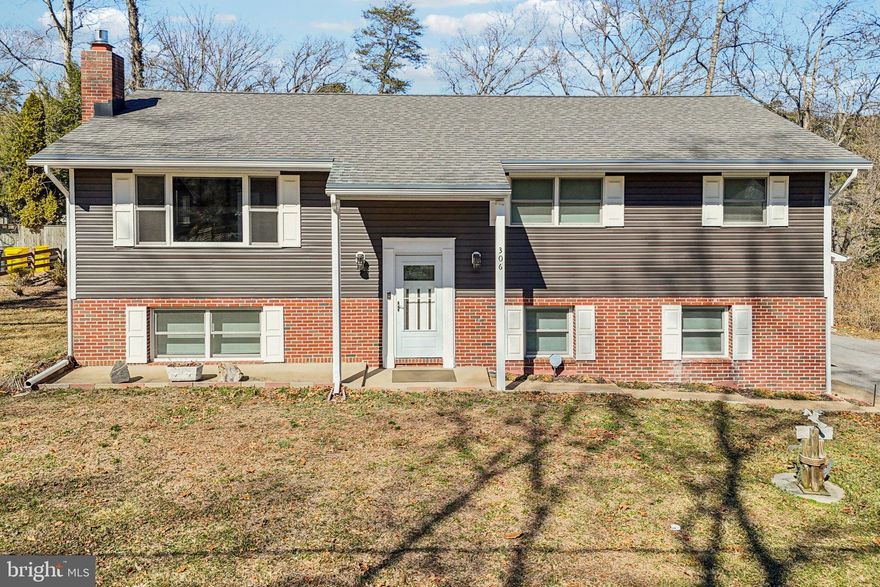 Nestled in the charming Selby Grove community, this stunning split foyer home has undergone a major renovation in 2022, blending modern luxury with timeless comfort. With 2,352 square feet of thoughtfully designed living space, this residence offers an exclusive lifestyle that caters to both relaxation and entertainment. As you step inside, you are greeted by an inviting atmosphere that seamlessly combines elegance and warmth. The heart of the home features a spacious living area adorned with a cozy gas fireplace, perfect for gathering with loved ones on chilly evenings. The open layout flows effortlessly into the dining area, where natural light pours in, creating a bright and airy ambiance. The gourmet kitchen is a chef's dream, boasting high-end appliances, sleek countertops, and ample cabinetry. Whether you're preparing a casual meal or hosting a lavish dinner party, this kitchen is equipped to handle it all with style and sophistication. This home offers four generously sized bedrooms, providing plenty of space for relaxation and privacy. The luxurious bathrooms, including three full baths and one half bath, have been meticulously updated with modern fixtures and finishes, ensuring a spa-like experience at home. The fully finished basement adds an extra layer of versatility, perfect for a media room, home office, or play area. With its thoughtful design, this space can adapt to your lifestyle needs, making it an ideal retreat for both work and play. Step outside to discover a serene half-acre lot, offering a peaceful escape from the hustle and bustle of daily life. The outdoor space is perfect for summer barbecues, gardening, or simply enjoying a quiet moment in nature. Located in the desirable Selby Grove neighborhood, this home is not just a residence; it's a lifestyle. Enjoy the convenience of nearby amenities while relishing the tranquility of suburban living. With its luxurious renovations and inviting charm, this property is ready to welcome you home. Experience the perfect blend of comfort and elegance in a space designed for modern living.