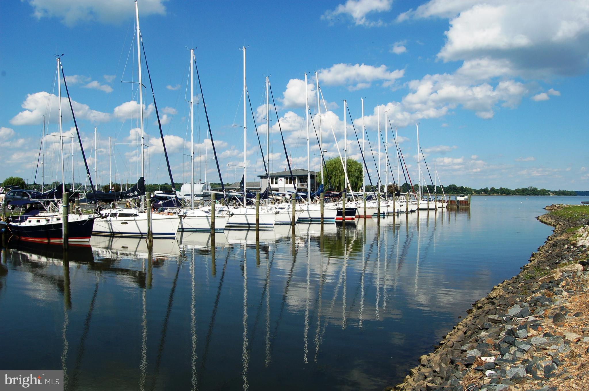 RESORT-STYLE LIVING IN CANVASBACK COVE (CBC)...Welcome to Havre de Grace's awesome waterfront condo community enhanced by a sparkling pool that overlooks the CBC marina and the Susquehanna River. Every unit has its own driveway and a 2-car tandem garage. Although this unit is not situated directly on the water, it's just steps away from the Tidewater Marina Lagoon, the CBC "point" with its abundant wildlife and awesome water views, CBC's greenspace, and the beautiful pool. The resplendent pool area is embellished with lovely flowers and has private his/hers showers and nearby green space for fun and games as well as charcoal grills and a picnic table. The community has 96 units with 72 boat slips. There are usually boat slips available for rent. This bright and cheerful penthouse unit has been nicely maintained and provides 2 main floor bedrooms & baths and a convenient main floor laundry closet. The cool spiral staircase takes you to the loft which can be used as a third bedroom, an office, music/craft room...you decide. Your deck overlooks the pool and green space, lovely landscaping, and meandering brick pathways. The "Great Room", consisting of the foyer, living rm, dining area and kitchen, gives you that wonderful open floorplan that you'll love, with the bedrooms and baths tucked away to afford the privacy you need. With newer appliances, a stacked washer/dryer unit, wall-to-wall carpet, 2-car garage, composite deck new in 2018, and a renovated master bath with an expanded shower, this unit is a winner for a lucky tenant. FABULOUS LOCATION! Park your car and leave it! CBC is within walking distance of the downtown area with its eclectic shops and restaurants as well as many museums, parks, marinas, Library, churches, the historic CONCORD PT. LIGHTHOUSE, and Havre de Grace's renowned PROMENADE, a scenic boardwalk which meanders along the Susquehanna River from the Lighthouse to the city Marina and Tydings Park. In 2014, Havre de Grace was voted one of the nation's top 20 (#12) small towns to visit by Smithsonian Magazine. There are continuing enhancements to the town including several wedding sites, 3 awesome concert/theater venues, and THE TIDE - a "park and ride" seasonal jitney service that takes folks around town to the various places of interest on weekends, so RIDE THE TIDE! Residents and visitors flock to Havre de Grace for it's 4th of July celebration with an old-fashioned parade, a concert in the park, and an awesome fireworks display. Come to Havre de Grace and Canvasback Cove to see what all the excitement is about! ***Please note: Only 1 pet, 20 lbs or under is allowed in CBC***There are no additional fees for parking or pool use***Condo fee covers flood insurance on the buildings. Ask agent for additional info***ALSO AVAILABLE FOR LEASE--MDHR2028906***