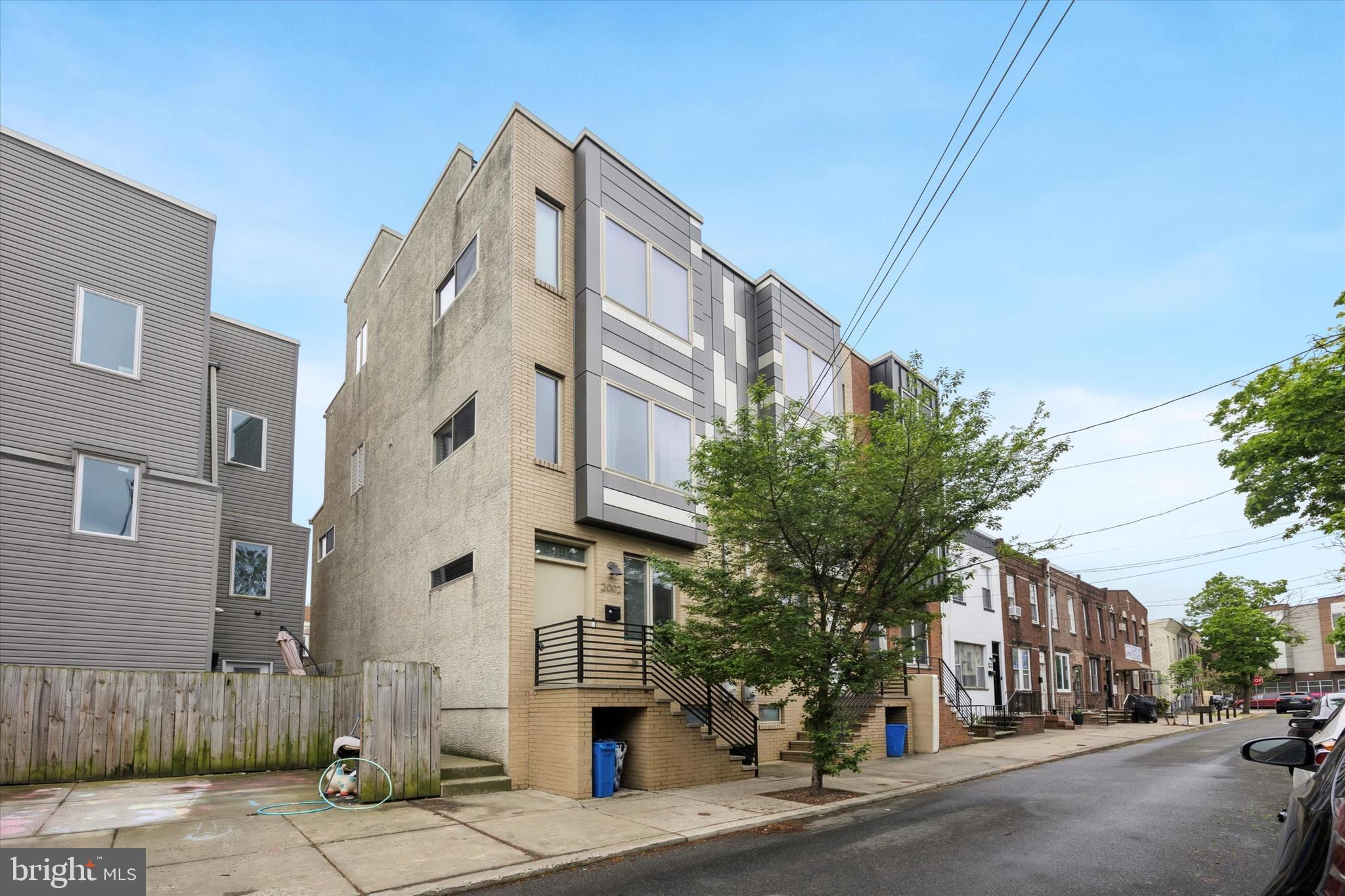 Ideal Home in Point Breeze! This four-bedroom, three-bathroom residence is available for its new owner. The basement includes a bedroom or den with a full bathroom, ample closet space, and a laundry room. The main level features a living room, dining room, modern kitchen equipped with stainless steel appliances, and access to a spacious rear yard. On the second floor, there are two bedrooms, both with generous closets, and a full bathroom. The third floor is dedicated to the master suite, which offers skyline views, a large walk-in closet, and a private bathroom. Continuing to the uppermost level, you will find an expansive rooftop deck that provides stunning views of the city skyline. Whether you prefer walking, biking, or driving, this location is conveniently situated just minutes from Center City. Do not hesitate to schedule a private tour of this beautiful home today.