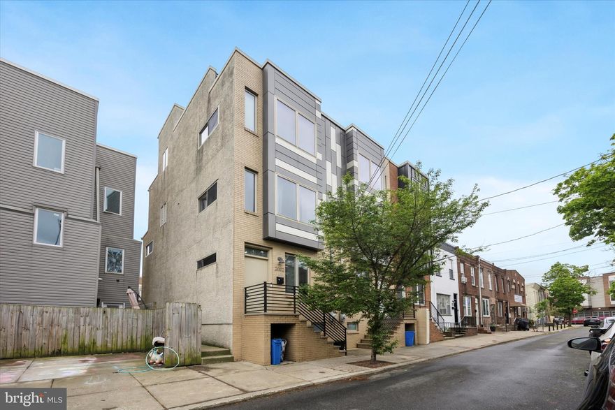 Ideal Home in Point Breeze! This four-bedroom, three-bathroom residence is available for its new owner. The basement includes a bedroom or den with a full bathroom, ample closet space, and a laundry room. The main level features a living room, dining room, modern kitchen equipped with stainless steel appliances, and access to a spacious rear yard. On the second floor, there are two bedrooms, both with generous closets, and a full bathroom. The third floor is dedicated to the master suite, which offers skyline views, a large walk-in closet, and a private bathroom. Continuing to the uppermost level, you will find an expansive rooftop deck that provides stunning views of the city skyline. Whether you prefer walking, biking, or driving, this location is conveniently situated just minutes from Center City. Do not hesitate to schedule a private tour of this beautiful home today.