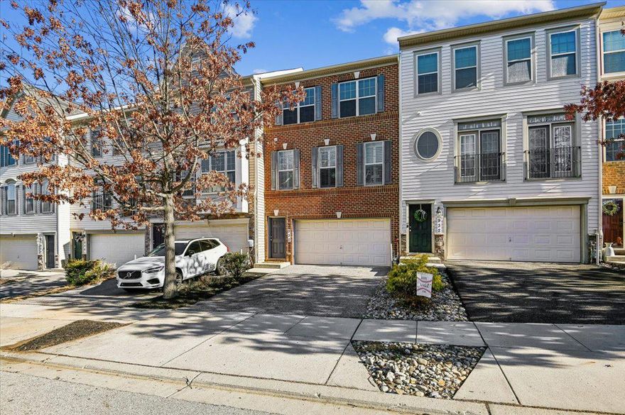 Beautiful brick-front TURN-KEY townhome offering over 2,300 sq ft, three finished levels, and a 2-car garage in the sought-after Canterbury Village community in Arnold. This spacious 4-bedroom, 4-bath home stands out for its size, updates, and exceptional value in the highly desirable Broadneck area, just minutes from Annapolis.
Inside, this beautifully maintained three-level home features a bright, open layout with modern updates and comfortable living spaces designed for both everyday living and entertaining.
The sun-filled main level features a spacious living room and a welcoming family room with a cozy gas fireplace just off the kitchen. The dining area is enhanced with elegant wainscoting and chair rail molding, adding classic architectural detail and character. Custom California shutters provide both style and privacy, while new hardwood flooring installed in January 2025 adds warmth and sophistication throughout the main level.
The kitchen features granite countertops, stainless steel appliances, a five-burner gas stove, and generous cabinet and counter space. A sliding glass door leads to the newly stained deck, creating the perfect space for outdoor dining or relaxing while overlooking the fully fenced backyard.
Upstairs, you will find three bedrooms and a convenient upper-level laundry. The spacious owner’s suite features tray ceilings with crown molding, a large walk-in closet, and a private bath with a double-sink vanity, a separate shower, and a soaking tub. The upper level also includes a full hall bath and new luxury vinyl plank flooring installed throughout in 2025.
The finished lower level offers additional living flexibility with new carpet, a fourth bedroom, and a half bath. A stylish barn door adds privacy, making the space ideal for a guest room, home office, or recreation area. Sliding glass doors open to a paver patio and fenced backyard.
Located just minutes from downtown Annapolis, the United States Naval Academy, waterfront parks, shopping, dining, and major commuter routes, this home offers the perfect balance of space, location, and lifestyle in the Broadneck area.