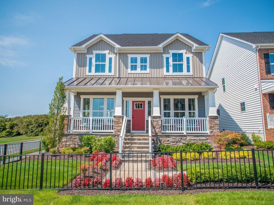 Home is to be built. Our neotraditional Mitchell borrows the best of the past  craftsmanship, attention to detail, and quality materials   while embracing the open living and casual elegance so important to today. As you enter the foyer you re immediately greets with a graceful arch that welcomes you into the home. An optional coffered ceiling in the dining room lends just the right touch, while a formal living room is perfect for entertaining. As you move through to the rear of the home the space becomes more open and informal. A huge family room opens to a kitchen across a large island; add the fireplace for a cozy focal point. A dinette provides the perfect spot for dinners at home. A sliding glass door opening to a covered porch brings the outdoors in   don t forget to extend the porch for even more outdoor space. Upstairs the old world charm continues with a large upper foyer. A double door entry opens to a luxurious primary suite with a tray ceiling, sitting area, and two huge walk-in closets. The bath features a double bowl vanity, compartmentalized watercloset, and Roman shower with a seat. A hall bath also features a double bowl vanity. Three generous bedrooms and a convenient 2nd floor laundry round out the upper level. Many areas offer an optional finished lower level that an feature a home office an full bath. The Mitchell comes in a variety of traditional, transitional and craftsman facades. Photos are for representative purposes only.