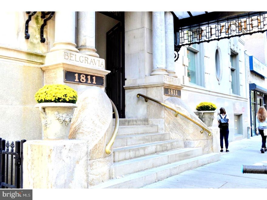 Premier 1- BD, 1- BA residence at The Belgravia, a distinguished historic building designed by Milligan & Webber in 1902, ideally located in the heart of RITTENHOUSE SQUARE one of Philadelphia’s most coveted neighborhoods. The building’s beautifully restored terra cotta and limestone façade makes a striking first impression, complemented by a grand lobby featuring original stained-glass windows, 24/7 concierge service, on-site property management, and elevator access. Inside the residence, a welcoming foyer leads to rich hardwood floors, oversized windows, and refined finishes throughout. The spacious great room offers flexible living and dining areas, perfect for both everyday comfort and entertaining. The open-concept kitchen is thoughtfully designed with granite countertops, stainless steel appliances, and a breakfast bar, making cooking and hosting effortless. The sun-filled bedroom provides a serene retreat with plush carpeting, generous closet space, and tranquil city views. The spa-inspired bathroom is finished in elegant Carrera marble, creating a luxurious atmosphere. A convenient in-unit laundry closet completes this well-appointed home. Residents enjoy access to an on-site fitness center and are just steps from world-class shopping, dining, and grocery options along Chestnut and Walnut Streets. With easy access to the Schuylkill River Banks trail and a quick commute to the University of Pennsylvania, Drexel University, and University City, this location offers unmatched convenience. RITTENHOUSE SQUARE PARK is just one block away placing the very best of Center City living right outside your front door.