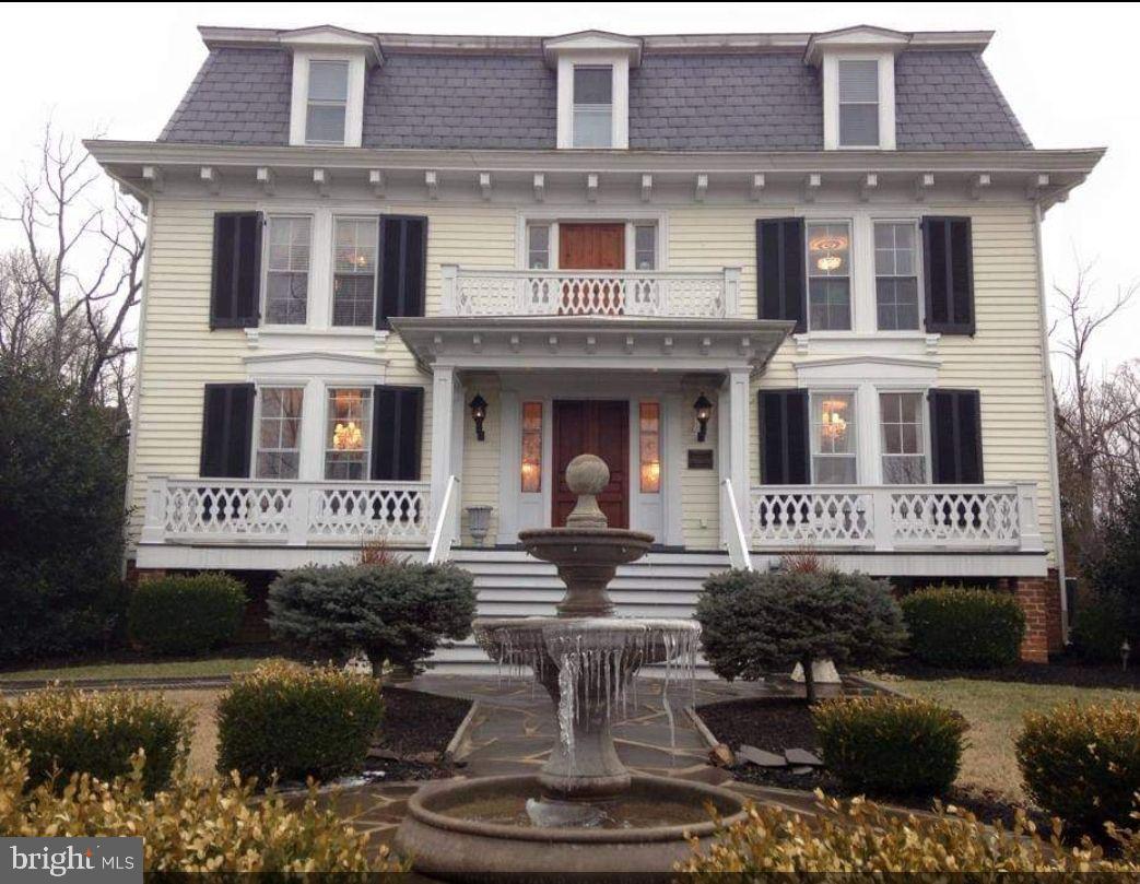 Nestled in the heart of Orange, Virginia, Chestnut Hill is a serene, picturesque property awaiting its next chapter. Once a nationally recognized and cherished bed and breakfast, this historic gem offers an extraordinary opportunity to restore it to its former glory—or reimagine it entirely. With six bedrooms and six bathrooms, nearly three acres of land, sidewalk access to local schools, shopping, and restaurants, as well as a private driveway and ample parking, the potential is truly endless. The property also features two outbuildings that provide additional versatility.
Though the home has faced challenges, including a fire that required extensive renovations, its foundation remains strong, ready for a visionary owner to bring it back to life. Thoughtful renovations, modern updates, and curated landscaping could transform Chestnut Hill into a breathtaking retreat once again. Whether you envision it as a boutique bed and breakfast, a private residence, or any other inspired use, the possibilities are limitless with the proper approvals. Since the restoration is only partially complete, there’s a unique opportunity to customize the space to perfectly suit your needs.
Imagine the possibilities—restoring it to its former status as a nationally recognized destination, creating a timeless retreat for guests seeking memorable stays, or reimagining the space for personal or professional purposes. With the right vision, this historic property can be transformed to achieve its full potential. Seize this chance to make your mark on an award-winning historic property. Chestnut Hill is ready to inspire your creativity and vision. Contact us today to explore the potential of this remarkable property and take the first step toward turning opportunity into reality.