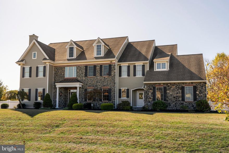 Immediate Delivery on this exquisite custom home located in Parker Preserve in Unionville - Chadds Ford School District. Picturesque setting on one of the finest homesites in this pristine community. The home site features a level and private back yard, professionally landscaped with a composite deck, stone patio, stone walls, and fire pit. This gem offers over 8,000 square feet of luxurious living space. Enter into a gracious center hall with an elegant main staircase, heavy moldings and columns, and wainscoting. Site finished hardwood floors throughout most of the first floor and upstairs hall. Formal Living Room with crown molding and gas fireplace with marble surround. Formal Dining Room with tray ceiling, crown molding, and wainscoting. Sunroom with extraordinary windows with transoms. (Currently used for a study). Outstanding Family Room with volume ceilings, a wall of windows, custom gas fireplace, and extensive built-ins. The Chefs kitchen features upgraded cabinetry with glass fronts, crown molding, and tile backsplash. Oversized island. Upgraded granite tops, pendant lighting, and Viking stainless steel appliances. Separate Breakfast Room with both kitchen and breakfast area opening directly to Family Room. Professional office. Bonus Room-great for Mom's room, hobby room, or separate computer/homework room. 2nd-floor laundry and lower level laundry. Enormous mudroom off of 4 car garage. The second level features a spacious master suite with tray ceiling, separate sitting and dressing areas. Large walk-in closet outfitted by California Closets. Spa-like Master Bath with his and hers custom vanities with granite tops. Custom tile shower and oversized tub. The secondary bedrooms are all very spacious with 3 additional baths upstairs. Bedroom # 5 could be a second master suite with its own sitting room bath and walk-in closet. There is a fully floored walk-up attic for additional storage. Also could be finished for more living space. The lower level is finished with outside entrance and features a living area with a fully equipped bar, full bath, bonus room, and a private theatre room. Would make a great in-law/au pair suite. This home has major upgrades and is priced to sell! Wonderful Brandywine Valley Location - close to local wineries, shopping, Winterthur, Brandywine river museum easy access to Wilmington, Philadelphia, 52, 202 & I-95. Move right in!