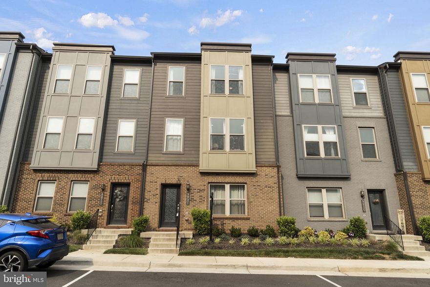 From the moment you walk in the door, you will feel at home! You will fall in love with this 3 bedroom 2 full and 2 half bathroom townhome with a 2-car attached garage.  Meticulously maintained and only 5 years old. The open-concept floorplan on the main level is perfect for entertaining! The heart of the home is the gourmet kitchen with designer cabinets, quartz counters, stainless steel appliances, and an enormous island! Gorgeous hardwood flooring on both lower and main levels and both staircases. Step outside to the deck, which is perfect for grilling out or relaxing after work. The lower level has an office or family/rec room,  half bath, and access to the 2-car attached garage. The primary suite on the upper level has 2 walk-in closets. The primary bath features a huge shower, double sinks, and a water closet. There are two additional bedrooms, an additional hall bathroom and a laundry area on the upper level for your convenience. This desirable neighborhood is located near the heart of Old Town Manassas, conveniently located near dining, shopping, Two Silos Brewing, the Manassas Regional Airport, commuter routes (Route 66, 234, 28) Bus Routes, and VRE! HOA fees only $54 a month.