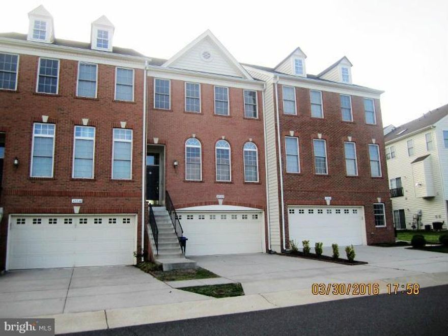 **BEST VALUE IN SOUTH RIDING! BRICK FRONT COLONIAL TOWNHOME W/3 FIN LVLS AND 2 CAR GARAGE*HDWD FLOORS IN LR, DR, & KITCHEN* VAULTED CEILING IN ALL BEDROOMS*LARGE MBR SUITE W/ SOAKING BATH, SHOWER & WALK IN CLOSET, FIN LL REC RM W/WALK-OUT. CLOSE TO RT 50, SHOPPING & PARKS.