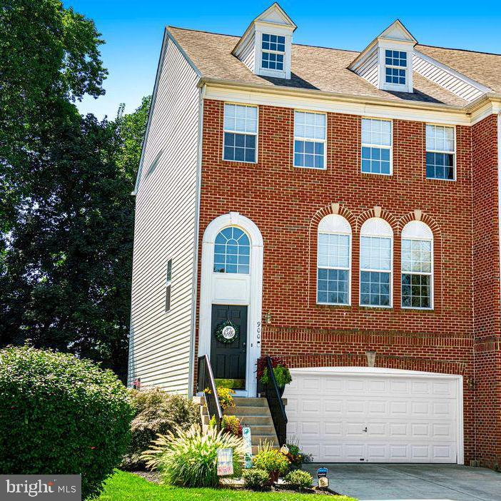 Prepare to fall in love with this magnificent end of group luxury townhome! This better than new, brick front home with 2 car garage has been beautifully updated and meticulously maintained by its owners.
The gourmet kitchen—recently remodeled to perfection—features a massive quartz island, chic pendant lighting, an adorable coffee bar with glass-front cabinets and wine chiller, and a gorgeous glass tile backsplash. The spacious family room is drenched in natural light from a dramatic wall of windows and warmed by a gas fireplace with marble surround and decorative mantel. Elegant crown molding, a modern ceiling fan, recessed lighting, and new luxury vinyl plank flooring create a sophisticated, open flow throughout the main level. Sliders with plantation shutters lead to an expansive, low-maintenance Trex deck with solar light caps, overlooking a private yard backing to mature trees—perfect for relaxing or entertaining. The updated powder room adds convenience and style. A bright, airy formal living and dining area is adorned with elegant crown molding and wainscoting. Upstairs, you'll find three generous bedrooms, including an updated primary suite and a convenient laundry room. The primary bedroom boasts a dramatic coffered ceiling, ceiling fan, and a huge walk-in closet with a rustic barn-style sliding door. The spa-like primary bath showcases a quartz-topped dual vanity, ceramic tile flooring, and contemporary lighting. Recent updates include: new roof (2019), new hot water heater, and LiftMaster garage door opener with MyQ technology. All appliances, television and extra refrigerator convey. The walkout basement offers versatile living space or in-law potential, with a bonus room featuring a second fireplace and wall-mounted TV, full bathroom, storage area, garage access, and a walkout to the backyard. Perfectly situated near the Bel Air Bypass, and just a short stroll to the Ma & Pa Trail, this home combines style, comfort, and convenience in one rare gem.
Don’t miss your chance to make it yours!
