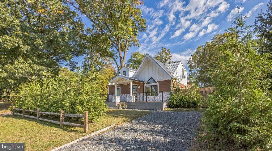 Welcome to your future dream home! This beautifully updated riverfront property is just waiting to be your perfect weekend getaway from NYC, offering a delightful escape just minutes from New Hope. Nestled right by the peaceful river, this charming home comes with a new roof, energy-efficient windows, fresh siding, and a brand-new HVAC system, ensuring comfort all year round, along with all the modern conveniences you could wish for. You’ll love whipping up meals in the spacious gourmet kitchen, complete with shiny new stainless steel appliances, elegant quartz countertops, and stylish cabinetry—perfect for entertaining friends or enjoying family meals together. And check out the stunning open riser floating staircase that adds a touch of classy elegance to the space! The luxurious bathrooms have been thoughtfully remodeled with contemporary fixtures and beautiful tile—truly an owner's dream! The open living room, with its soaring cathedral ceiling and cozy custom bar, is flooded with natural light and features new flooring throughout, creating the ideal setting for family gatherings or cozy evenings by the fireplace. Step outside to your very own private dock, where you can enjoy boating, fishing, or just relaxing by the water. Picture yourself soaking in those gorgeous views and having direct access to the river! The property also boasts a beautifully landscaped yard with plenty of space for outdoor fun, entertaining, or simply soaking in the peaceful surroundings. Plus, you’ll love the convenience of being close to local amenities, parks, and recreational activities. This home is move-in ready and waiting for you to add your personal touch! Don’t let this rare opportunity slip away to own your slice of paradise on the river. With easy access to I-95, New Hope, Princeton, and NYC, you truly can have a weekend getaway.