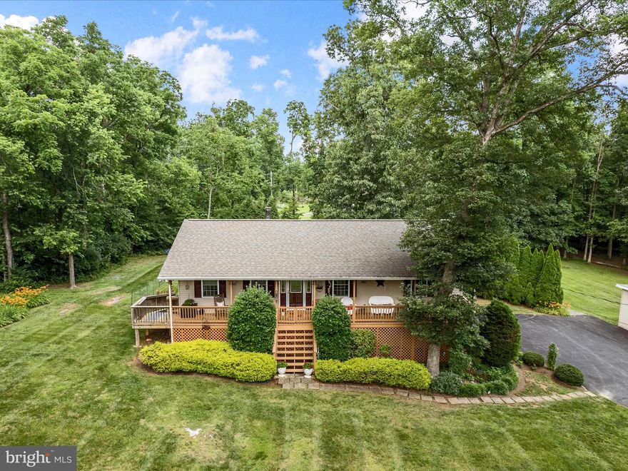 A Truly Exceptional, One-Owner Rancher on Expansive Grounds!  A true gem nestled on an impressive 2.82 acres of unrestricted land. This immaculate residence offers a generous floor plan with 3 spacious bedrooms and 2 full baths, complemented by an oversized garage for all your storage needs. The full-length covered front porch invites you to relax and enjoy the scenic beauty of the surrounding landscape.
The meticulously maintained, mature landscaping is nothing short of breathtaking, providing a serene and picturesque setting that enhances the home's natural charm. An additional detached garage offers extra versatility and storage, while the fenced backyard provides privacy and security, perfect for outdoor living or entertainment.
This extraordinary property combines tranquility with convenience and is certain to captivate the discerning buyer. Opportunities like this are rare—call today to schedule your private showing before it’s gone!