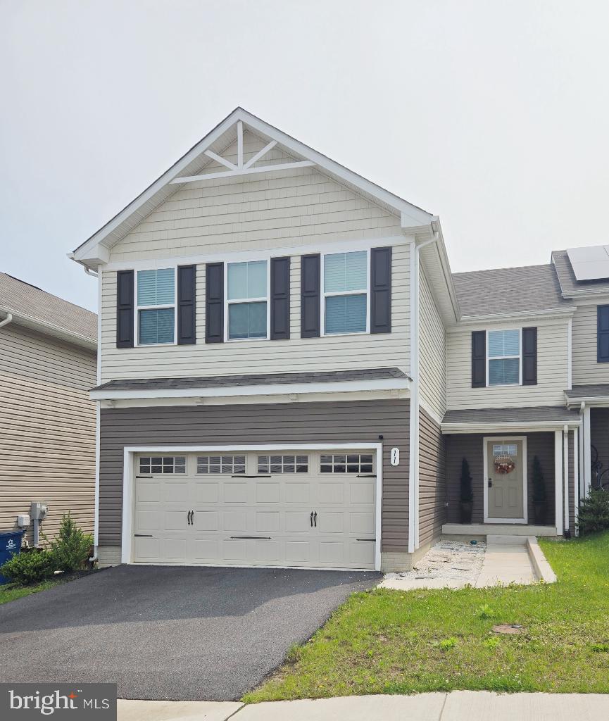 This modern 4-bedroom, 2.5-bathroom duplex—built in 2021—is the perfect place to raise a family. Step inside and you’ll immediately notice the spacious two-car garage and low-maintenance LVP flooring that flows through the main living area and kitchen.
The bright kitchen features white cabinetry and opens to a dining area with access to a 12×14 second-story deck—larger than most in the neighborhood and ideal for relaxing in the evening sun. A convenient half bath completes the main level.
Upstairs, the primary suite includes a large walk-in closet and a private en-suite bathroom with a double vanity and white cabinetry. Three additional bedrooms offer flexibility for guests, children, or a home office. A laundry room on the upper level adds everyday convenience.
The walk-out basement boasts open ceilings with string lighting, LVP flooring, a faux brick accent wall, and a chalkboard wall—perfect for entertaining or a rec room. Step outside to a fully fenced backyard with privacy fencing and covered outdoor space under the deck.
Community Perks:
Located directly across from the community clubhouse, you’re just steps from the pool, playground, pavilion, open field, and extra parking. Two dog parks are also nearby. Ridgely Forest is a wooded neighborhood with easy access to I-95 and Route 40, and just minutes from North East’s charming Main Street, known for its top-rated restaurants.