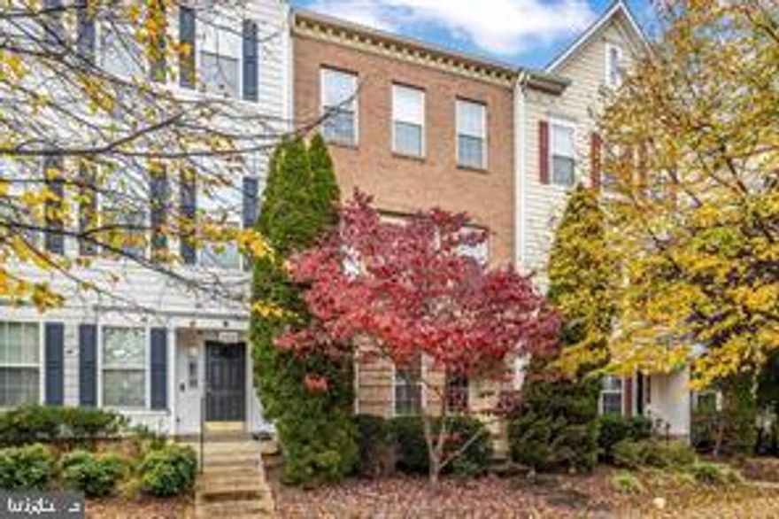 Ternbury II model perfectly situated in the Villages of Urbana with detached two car garage and full privacy fencing.  Only 2 blocks from one of the three community pools, tennis courts and basketball courts.  Walking distance to library, grocery, retail and restaurants.  Entry level features large rec room, bedroom / office and full bath.  Main level features gleaming hardwood floors, center island kitchen with granite counters and upgraded 42' cabinets.  Almost new stainless steel appliances.  Dining room and living room with raised stone hearth fireplace .  Upper level features two huge bedrooms each with their own full bath.  Exterior has expansive paver patio and nice low maintenance deck.  Community playground surrounded by wrought iron fence directly behind detached two car garage.  HVAC recently replaced, not original.  Unobstructed view of the Urbana library from all levels.  Easily add wall and another door to upper level bedroom to create a 4th bedroom. DON'T MISS THIS ONE!