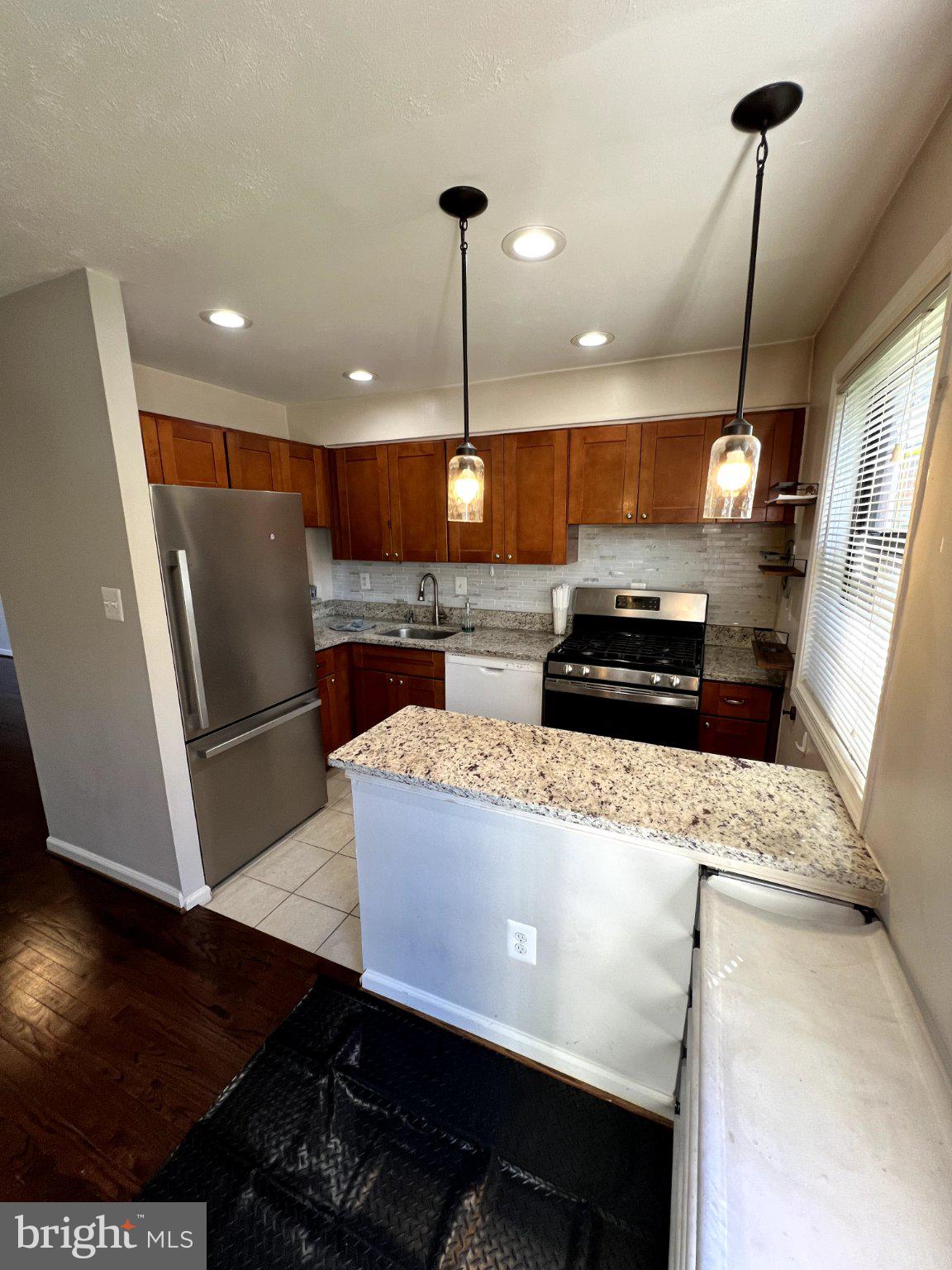 11124 ROCK GARDEN DRIVE