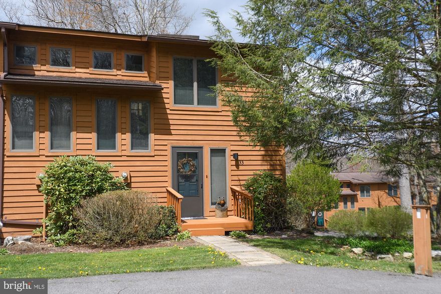 Rarely available three-level, three bedrooms, and three full bathrooms townhouse in the lovely Laurel Brook Community. This open-floor end-unit sits on top of the hill, with views of the woods, a short drive to Deep Creek Park and all of the entertainment the lake provides, and another short drive to the various ski areas and additional parks. The unit features less than two-year old plank flooring throughout;  new stove/oven and  dishwasher (2020), new refrigerator (2021), new dryer (2023), new roof and skylights (2023), a beautiful deck with lots of privacy, two parking spaces, and comes fully furnished. The Community is well-managed and includes year-round care of the outside.  Whether this will be your permanent home or a get away from the near DMV area, this is a perfect place for anyone looking for peace and quiet and the feel of the mountains.