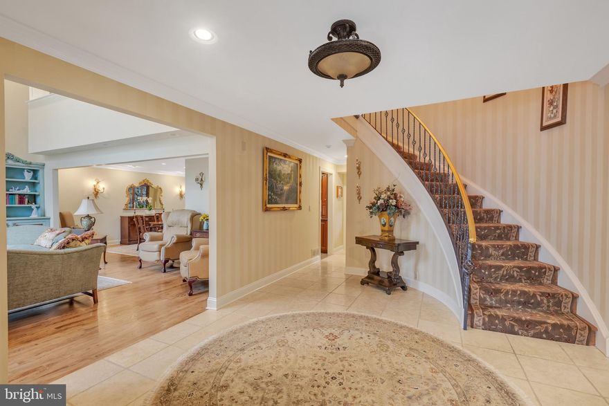 Welcome to Luxury Living at the sought after Hermitage Estates!  Located on the Main Line with close proximity to Center City Philadelphia, minutes away from Suburban Square, shopping ,fine dining and in the award winning Lower Merion school district!  Upon entering through the gate, you are greeted by your private flagstone picturesque courtyard. This gorgeous turn-key home presents a sophisticated formal foyer with a sweeping staircase. To your left is  an impressive living room with a fireplace and glass French doors to the patio. Entertain in your spacious, elegant dining room with crown molding that leads you to your breakfast room with a vaulted ceiling and filled with sunlight. Enjoy culinary delights in your updated kitchen with granite countertops and new appliances. Off the kitchen is a cozy, open den with a fireplace and a half  bathroom to finish the floor. With this open floor plan there is plenty of space for an elevator or lift.  Upstairs you will sleep well in a lavish master bedroom with built in cabinetry,  walk-in closet and sitting area. Two additional bedrooms and a full bathroom complete this floor. A fully finished basement with wet bar, guest room, fireplace, half bathroom and additional exercise/office room enhance this magnificent home.     An addition to the home is an annex above the garage with a private side entrance, kitchenette and full bathroom. Upgrades throughout include sliding doors on both decks, indoor and outdoor LED lighting, Standby Generator, Garage Flooring with a Tesla charger, Security System with Central Water shut off, digital door lock and Wi-Fi thermostats.