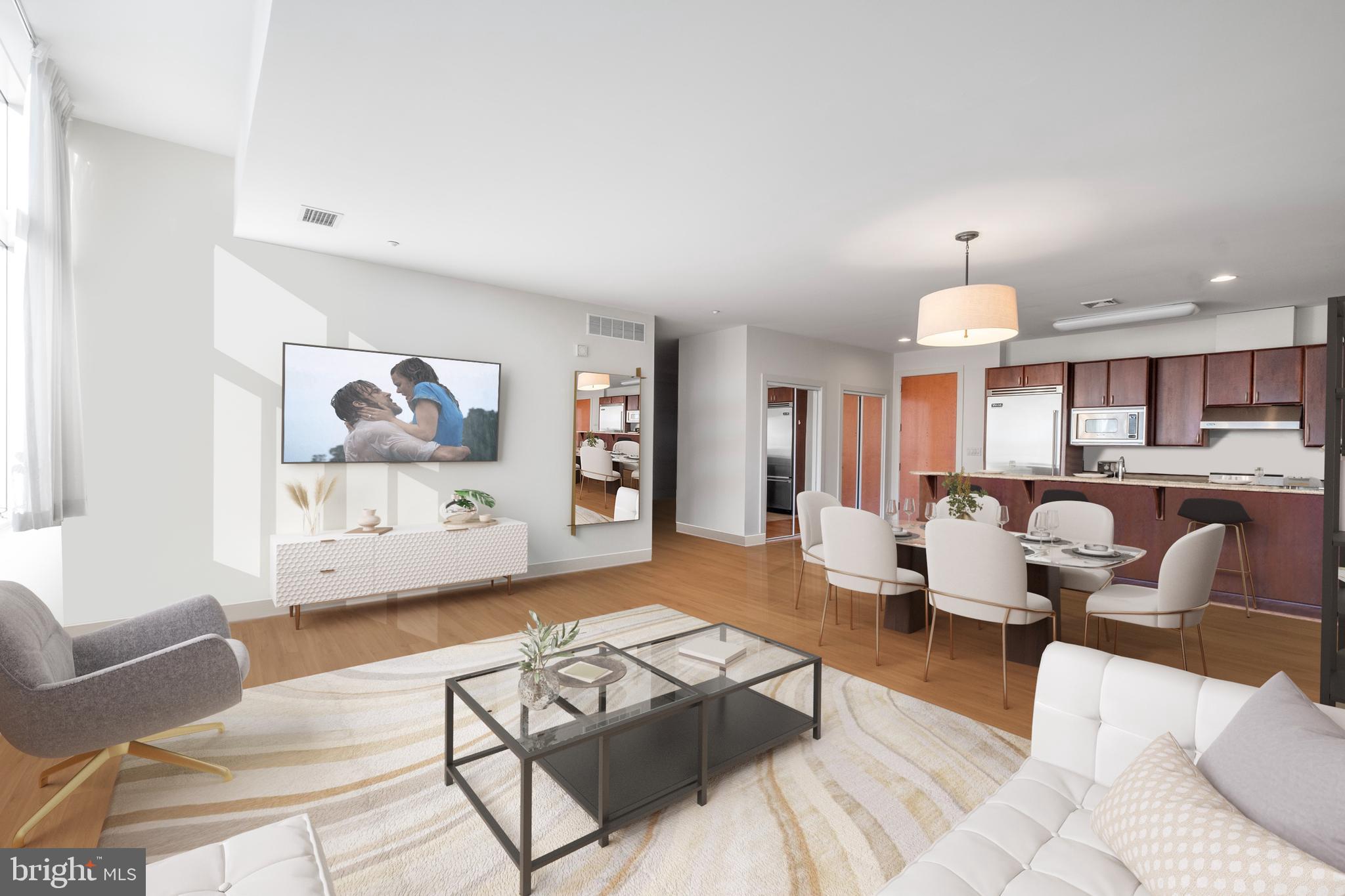 This spacious and gracious 2 bedroom, 2.5 bathroom CONDOMINIUM, with the ultimate den, and NO TRANSFER TAX is now available for sale at 23 S 23rd Street. Offering OVER 1,800 square feet of exceptional living space. The expansive living and dining areas, WITH WESTERN EXPOSURE, create an inviting atmosphere, with stunning hardwood floors throughout and soaring ceiling heights that ENHANCE THE SENSE OF OPENNESS. The chef’s kitchen is a true highlight, featuring luxurious granite countertops and top-of-the-line stainless steel appliances, making it a PERFECT SPACE for cooking and entertaining.
Both bedrooms are exceptionally spacious and boast excellent closet space. Each full bathroom is beautifully designed with large, elegant tile work. Your massive den provides versatile space, ideal for use as a HOME OFFICE, PRIVATE GYM, and/or a PLAYROOM. For added convenience, ONE GARAGE PARKING SPACE is included. Don’t miss out on the opportunity to call this incredible condominium your new home, and enjoy being minutes from RITTENHOUSE SQ, Penn and Drexel University, 30th Street train station, and SCHUYLKILL RIVER TRAIL!