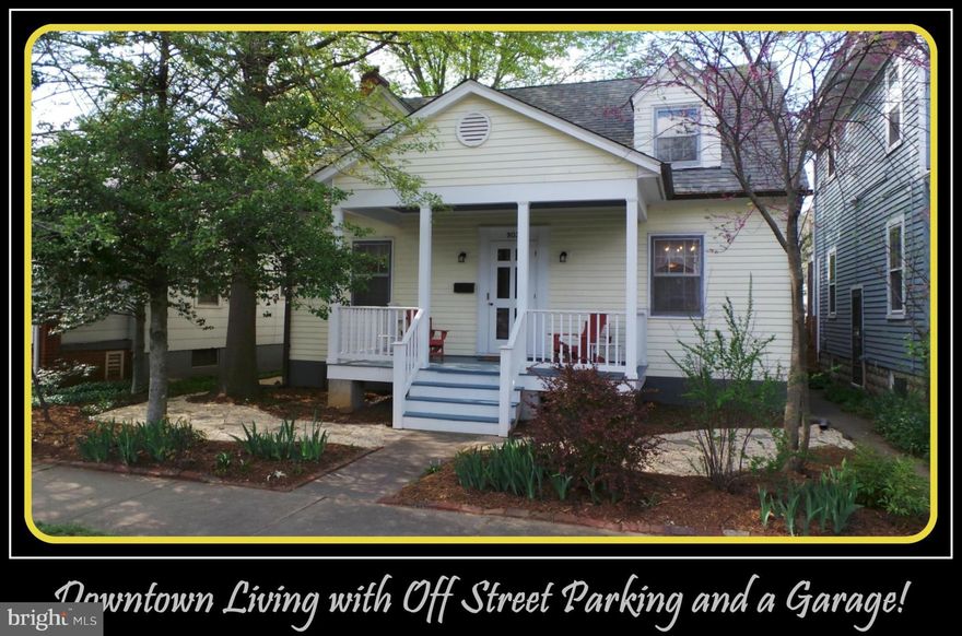 Charming downtown home with garage & off street parking!   This home has an open floor plan with updated kitchen, skylights in bedrooms & rec room in basement.  Hardwood floors, wood stove in the living room, window wall opens to multi-tiered teak deck & gardens that will make you feel like you have your own personal park!  Hardware in kitchen handcrafted by local artisan. Walk to VRE & downtown!