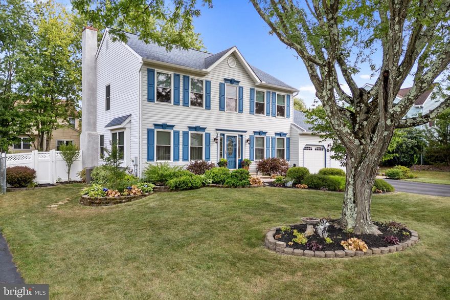 Welcome to Cabin Run Road. This exquisitely maintained colonial boasts verdant landscaping and a paver walkway that leads to an elegant foyer entrance, showcasing shining Brazilian cherry hardwood floors. The first floor is bathed in natural light all day, giving the home a warm and inviting ambiance. The formal dining room features crown molding, chair rail, and hardwood floors. Adjacent to the foyer on the left is a formal living room with a box bay window, and glass French doors that lead to the family room. Enjoy the comfort of the family room with its gas fireplace and plentiful windows offering views of the fenced backyard. The family room flows into a recently updated kitchen, complete with an island, walk-in pantry, Butler's pantry, and space for a dining set near an atrium door that opens onto a 32’ x 13’ composite deck. The first floor is rounded out by a refreshed powder room and a spacious laundry/mud room with ample cabinet and closet space. The second-floor houses four bedrooms and two full bathrooms. The spacious master bedroom features a walk-in closet and a renovated en-suite bathroom with Quartz countertops, cherry cabinets, and a frameless shower door. The other three bedrooms share the renovated hallway bathroom. The finished basement offers additional space for hobbies, entertainment, exercise, or relaxation, along with an extra room for storage. The property's exterior, with its beautiful flower gardens, adds to the curb appeal. This property, located in the Central Bucks School District, is a short drive from Doylestown Borough, with its historic sites, shopping, dining, and major thoroughfares for convenient commuting.