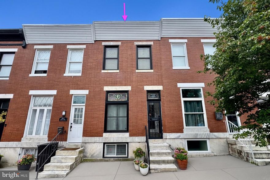 OPPORTUNITY KNOCKS! Brewers Hill home, off street parking,  AND a  lower level income property!
Welcome to this beautifully updated three-level rowhome  located in the heart of Baltimore City’s sought-after Brewers Hill neighborhood. Built in 1915, this classic brick home blends historic charm with thoughtful modern upgrades—offering the perfect combination of character, comfort, and versatility.
Iconic marble steps welcome you to the main level, where you’ll find soaring ceilings, rich moldings, exposed brick accents, and engineered hardwood floors that extend throughout the space. The bright and spacious kitchen is outfitted with stainless steel appliances, dual sinks, and ample cabinetry, with room to add an island if desired. A convenient powder room and direct access to the spacious private rear parking pad/ patio area,  adding to the functionality of the main level.
Upstairs, the home features two generous bedrooms filled with natural light, a fully renovated luxury bathroom, exposed brick walls, and the convenience of bedroom-level laundry. The primary suite includes his and hers closets, tall ceilings, and gleaming hardwood floors—rare finds in a home of this vintage.
The fully finished lower level offers exceptional flexibility and income potential. With its own private exterior entrance and interior access to the main home, this space is ideal as an in-law suite, au pair quarters, or a short- or long-term rental. It includes a spacious bedroom, an open-concept living area, a second fully equipped kitchen with maple cabinetry, and a beautifully renovated full bath.
Major updates—such as a new roof and windows in 2024—provide peace of mind for the next owner. Located just moments from top-rated restaurants, boutique shopping, parks, and commuter routes, this home offers an unmatched urban lifestyle in one of Baltimore’s most vibrant communities.
Don’t miss your chance to own a truly special property in Brewers Hill—schedule your private tour today!