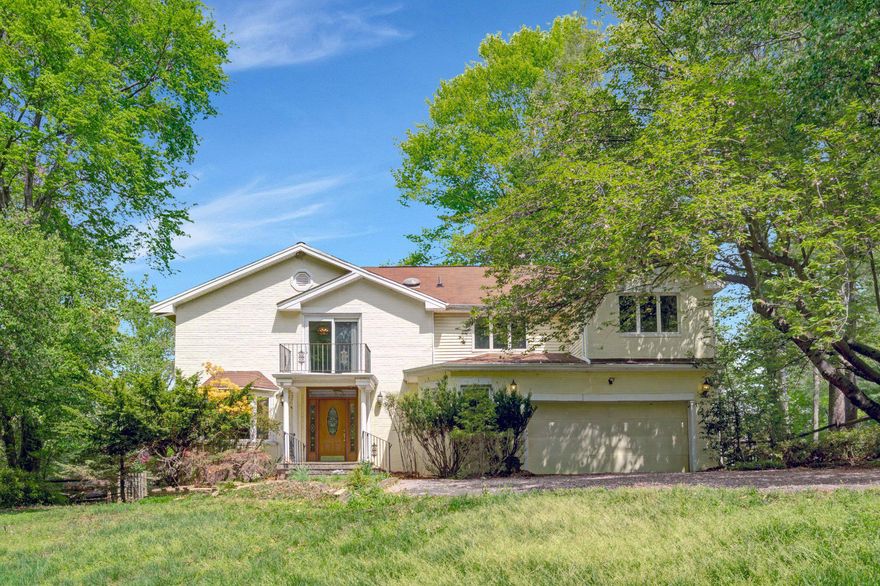 Exceptional Opportunity in Oakton’s Prestigious Cinnamon Ridge!
Tucked away in a quiet, tree-lined enclave, this half-acre property offers rare privacy and potential. The stately 3,244 sq ft stucco home (plus finished lower level) boasts an in-ground pool and an ideal layout ready for your personal touch.
Step inside and you’ll sense the home’s original grandeur—rich trim work, two fireplaces, and abundant natural light add warmth and character throughout. The main level features a generous living room and dining room, an open kitchen with center island and sunny breakfast nook, and a spacious family room with built-in shelving and French doors. A powder room, laundry room, and two coat closets add everyday convenience, along with a drop zone off the two-car garage.

Upstairs, the light-filled primary suite includes a large bath with double vanity, soaking tub, separate shower; walk-in closet; and an additional reach-in closet. A second bedroom enjoys its own en-suite bath—perfect for guests—while two more bedrooms share a full hall bath. A large bonus room with hardwood floors offers endless possibilities as an office, studio, 5th bedroom, or guest space.
The expansive walk-out lower level includes a recreation room, full bath, and workshop—plus easy access to your private pool oasis.
Just minutes to Chain Bridge Road, 6 minutes to I-66, and 10 miles to Tysons Galleria, this home blends serenity and convenience in one of Oakton’s most desirable neighborhoods.  This home is being offered for sale AS-IS.  
MORE PHOTOS TO COME.