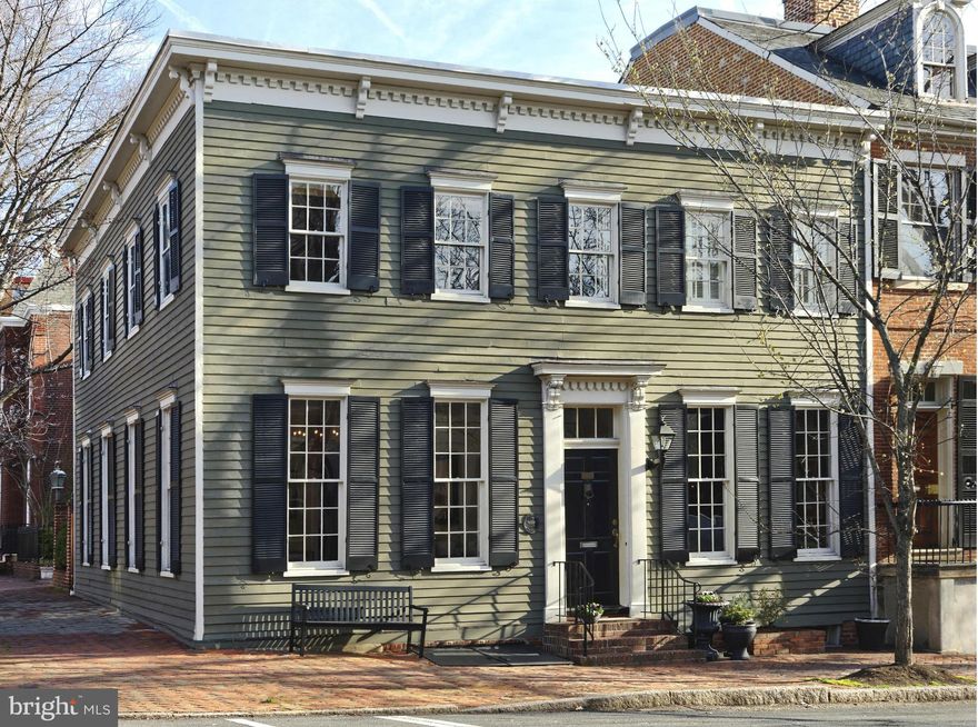 Modern open flow for comfortable family living & entertaining in spacious rooms w/high ceilings. First floor family room w/built-ins adjoins the sleek renovated chef's kitchen. Exciting exposed brick in several rooms, lending an architectural touch. Recently renovated bath w/large shower & seamless glass shower door. An abundance of natural light flows through all rooms. Private court yard & patio