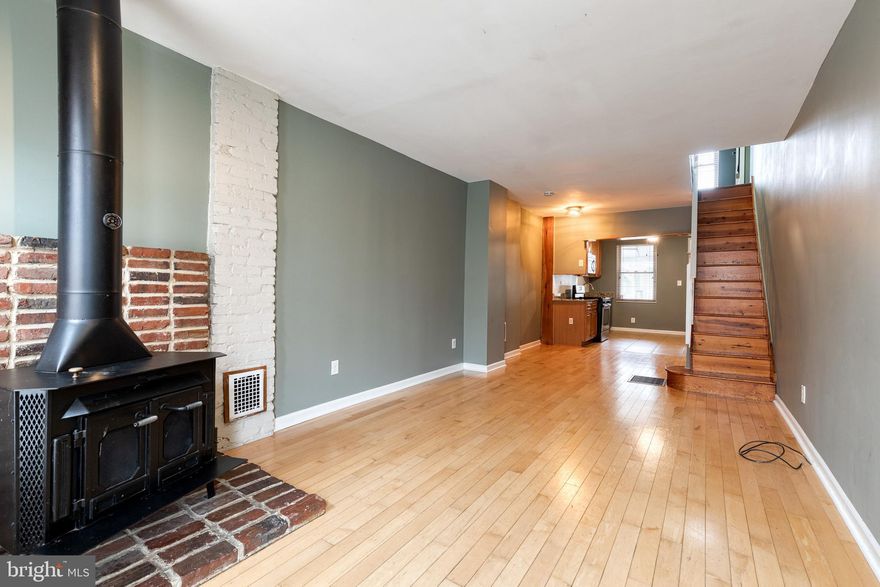 This Beautiful,  MUST SEE 3BR/1.5BA classic Baltimore townhome offers an abundance of natural light, an open concept main floor, high ceiling, and beautiful flooring. The spacious living room features a free standing wood burning stove with a brick hearth. The open flow into the dining area and kitchen makes it ideal when entertaining. The kitchen has tile flooring, wood cabinets, granite counters, and stainless steel appliances. The second floor has two primary sized bedrooms, one with a cedar lined closet, and a full bath. An exposed painted brick wall leads to the lower level with a finished room featuring a wood plank ceiling, built-in shelving and storage closets. A clean and dry laundry/utility room, and a walk-out to the rear completes this space. Last but not least, there is a parking pad!

Monthly rent is priced at $2500/month; first month's rent and one month security deposit needed to move in ($5000). Utilities are not included in the price. Verifiable income of at least 3x monthly rent and 650 minimum credit score is necessary to qualify. Pets are allowed and will be considered on a case to case basis.