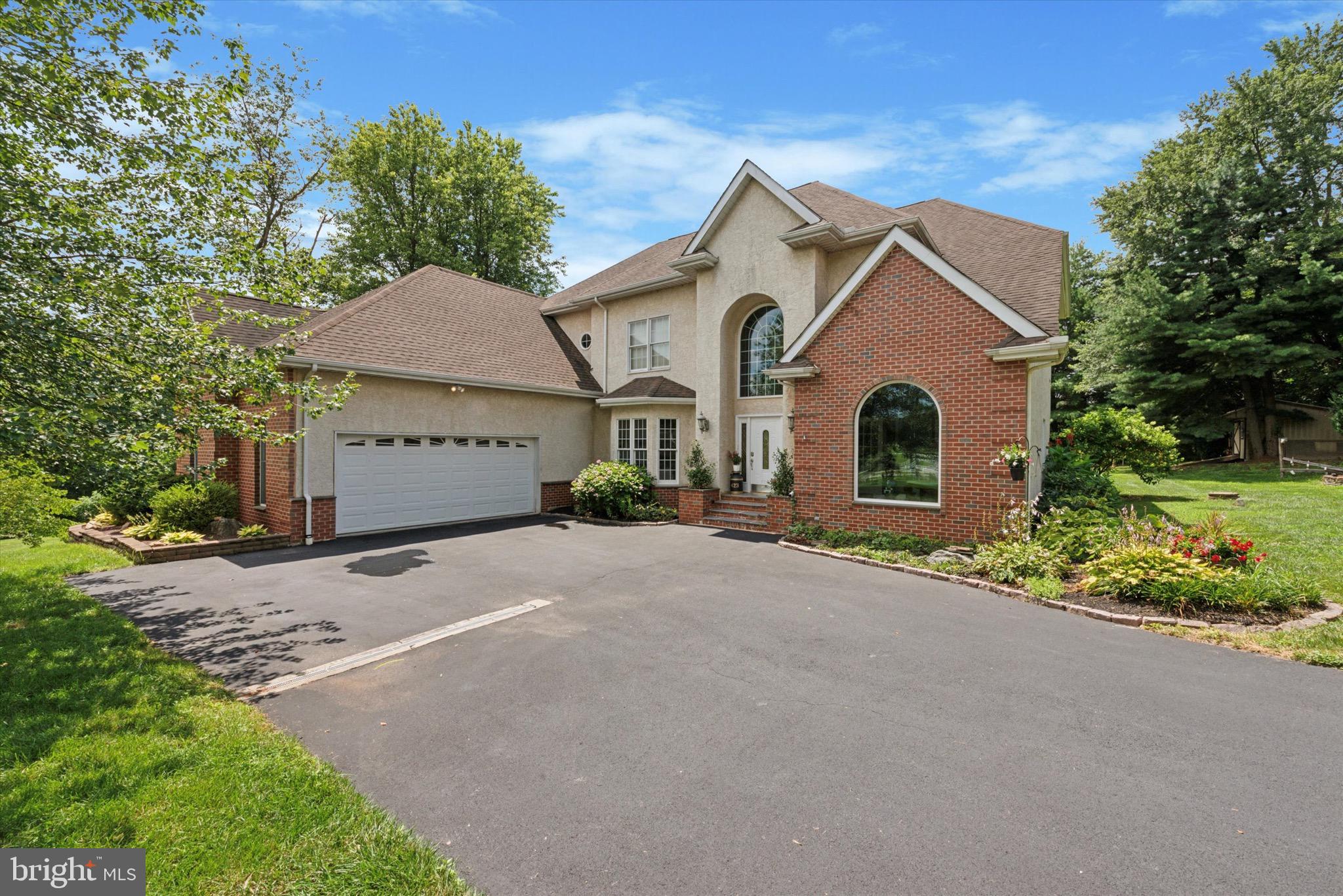 Exquisite Custom Home in the Heart of Chester County Horse Country! Welcome to this timeless, custom-built Traditional home, nestled in the rolling countryside of Chester County’s prestigious horse country. This exceptional 4-bedroom, 3.5-bath residence offers over 4,000 square feet of beautifully curated living space, thoughtfully updated with luxury finishes and modern conveniences throughout.
Step inside to discover a stunning gourmet kitchen featuring a two-tier center island, a brand-new gas cooktop and wall oven (2025), refreshed backsplash, flooring, lighting, and paint (2025). The adjoining breakfast nook opens to a spacious 15’ x 18’ deck with retractable awning—perfect for morning coffee or al fresco dining. The formal dining room is a picture of elegance with floor-to-ceiling windows, crown molding, chair rail, new lighting and paint (2025), and original hardwood floors. Across the hall, the sunken living room showcases a dramatic floor-to-ceiling fireplace, original hardwoods, and French doors leading to the rear deck—ideal for indoor-outdoor entertaining. A rare first-floor Primary Suite provides a private retreat with a large closet with built-ins, a spacious bedroom bathed in natural light, and an elegant en suite bathroom renovated in 2022. A separate sitting room with French doors, wainscoting, and crown molding completes this serene sanctuary. Upstairs, a second luxurious Primary Suite awaits, complete with a newly designed separate vanity area, new flooring and fresh paint (2025), dual cedar-lined closets with pocket doors, and an expansive spa-inspired en suite bath featuring a whirlpool tub, a newly tiled shower with frameless glass door (2025), dual vanity, and a soothing, freshly painted finish. Two additional generously sized bedrooms, refreshed with new flooring and paint (2025) a full guest bath, and a 21’ x 12’ office with skylights and remote-controlled shades provide ample space for work and relaxation. Outside, your private oasis includes a large in-ground pool, gazebo overlooking a tranquil koi pond, playset with playhouse, chicken coop, observation deck with views of neighboring horse farms, and a lawn shed for storage—all perfectly situated on a peaceful, picturesque lot. Notable updates and mechanicals include: HVAC (2022), Hot Water Heater (2020), Roof repairs with ice guard (2021), Well Head (2022), Insect Proof Well Cap (2025), Water Softener (2018), Water Pressure Tank (2025), Central Vacuum System, 61’ x 38’ unfinished basement—endless possibilities for expansion This unique property offers the best of countryside serenity and high-end living. Whether you're hosting guests, working from home, or simply soaking in the stunning views, every detail of this home was designed with comfort, quality, and lifestyle in mind.