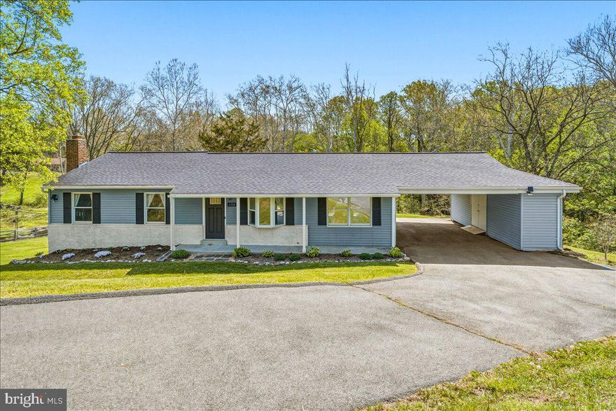 Welcome to your private retreat at the end of a peaceful cul-de-sac, nestled on over 3.5 acres that stretch to the top of a wooded hill and back to scenic farmland—offering exceptional privacy and tranquility.

This beautifully maintained ranch-style home features 3 bedrooms and 3 full bathrooms, combining comfort with thoughtful updates throughout. The main and lower levels showcase newer luxury flooring and recessed lighting, creating a bright, modern atmosphere. The inviting kitchen features a newer picture window that perfectly frames serene views of the woods and stream, while the sun-filled living area is enhanced by a newer bay window.

Recent updates include a newer refrigerator (approx. 1 year old) and a Bosch dishwasher (approx. 2 years old), ensuring both style and functionality.

Step outside to the newly built composite deck with modern white railings and black spindles—an ideal space to relax or entertain while overlooking the peaceful, wooded backdrop.

The renovated lower level offers a spacious recreation room, bonus room, full bathroom, and a cozy wood fireplace insert with a brick hearth and elegant mantel.

Additional updates include a newer washer and dryer, a water heater replaced in 2024, and a well pressure tank replaced in 2026. The roof is under 10 years old per previous owners.

This home has been meticulously cared for, with recent septic pumping and inspection completed in March 2026, along with a fireplace inspection showing no issues. The property has also been regularly serviced by professional pest control.

Outdoors, enjoy a true park-like setting—perfect for bonfires, exploring, sledding, and experiencing nature, complete with frequent wildlife sightings. A convenient carport with attached storage adds everyday practicality.

Located in a well-established neighborhood, this property offers the perfect balance of privacy and accessibility. Zoned for the highly rated Frederick County School District, including Twin Ridge Elementary, New Market Middle, and Linganore High School. With easy access to MD-27, I-270, and I-70, you’re just minutes from shopping, dining, golf, and entertainment.

Appraised at $600,000 in March 2026, this home offers immediate built-in value at its current list price.