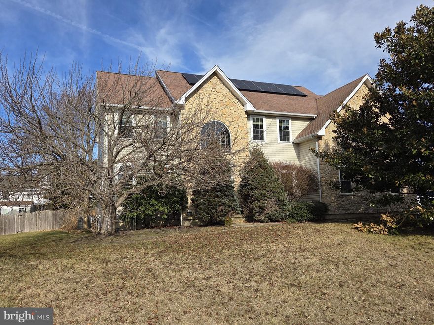 Wow! Stunning 4 bedroom, 2 1/2 bath stone and vinyl home with gorgeous saltwater pool on a large private cul-de-sac lot in the sought after community of Meadow Glen in the award-winning Appoquinimink School District above the canal! Convenient to major routes, shopping, dining and Lums Pond State Park with areas for hiking, boating, fishing, camping, picnics, etc. Grand 2 story entrance with gleaming hardwood flooring leading through the living room, dining room, family room and kitchen. Convenient den/home office with French doors on the first floor. Dramatic 2 story family room with gas fireplace and large palladium windows. Spacious kitchen with pantry, 42" white cabinets, tile backsplash, granite countertops and butler's pantry.  Andersen sliding glass door from the kitchen leads to composite deck overlooking your private backyard oasis! Front and back staircases lead to catwalk overlooking the family room and the foyer. Luxurious private primary suite impresses with vaulted ceiling, sitting room, 2 walk-in closets, updated en-suite bathroom with imported copper soaking tub, tile shower and double sinks. Finished basement with rec room plus a room used as a 5th bedroom with a closet. To top it off, save energy and money with owned solar panels!  No lease!  Hurry to schedule your private tour today!