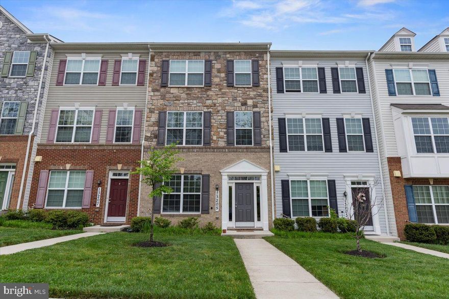 STUNNING 3 bedroom, 4 bathroom townhouse in highly regarded Montgomery County area. Great access to the ICC and I-95 makes commuting to DC or Baltimore very easy. Within a short drive of The Filmore entertainment venue and downtown Silver Spring area that hosts several musical, entertainment and other festivals. This townhouse is located within close proximity to museums, golf courses and a few parks. This townhouse is SPACIOUS and WELL KEPT. Gorgeous Acacia hardwood floors flow throughout the entry level and 2nd level of the house.

ENTRY LEVEL, upon entering the front doorway, you will walk into an inviting space that can be used for entertainment, work or exercise. It also includes a bathroom, storage closets, and access to the over-sized rear 2 car garage.

On the SECOND LEVEL, you will quickly see the spacious living room that expands into a combined dining area and kitchen.  This large kitchen and dining area is quite incredible--you will love it! The large chefs kitchen boasts significant granite counter space, and an over-sized granite island that all of your friends and family can gather around. The kitchen has several top and bottom exceptional cabinets, and stainless steel appliances. In addition, a large deck opens up right from the dining/kitchen area.

The THIRD LEVEL has 3 lovely bedrooms, 2 full bathrooms and a newly updated laundry room with high-end washer/dryer and a deep laundry utility sink for your laundry needs. The beautiful owners suite has tray ceilings, wonderful en-suite bathroom, and  a large walk-in closet. The 2  additional bedrooms are perfect for guests, kids or office space. Bedroom 2 accommodates a king size guest bed, and Bedroom 3 is well-sized for kids or for an office space.

Front yard grass area, playground within short walk of the property and the street ends in a lovely cul de sac allowing for outdoor living too.

This is WONDERFUL SPACE to call home. 

This is an AS IS sale. Offers are DUE on Tuesday 5/10/2022 at MIDNIGHT.  Listing Agent Iana Capers with any questions.