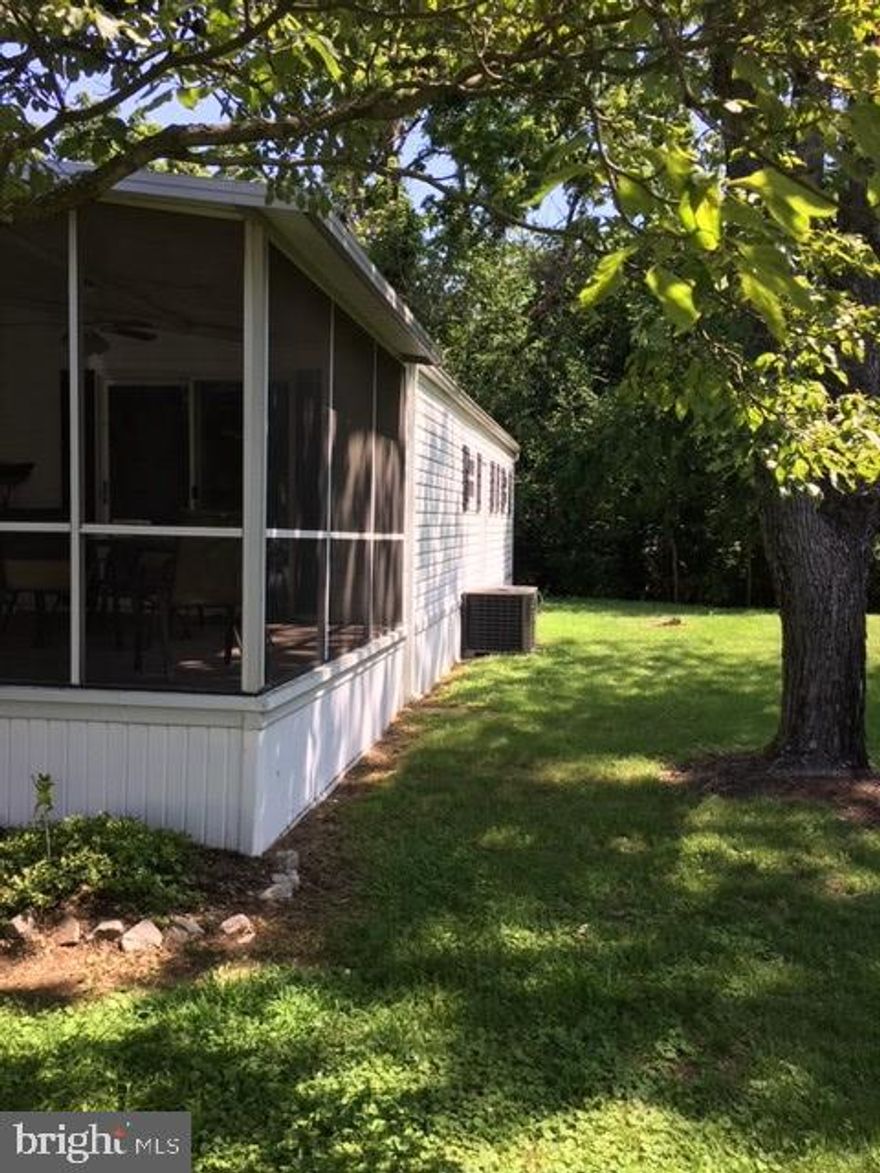 Make owning your own home a priority in 2020! Lower than low interest rates might make owning so more affordable than renting. Ask your Realtor to show you how. Listing agent represents the seller, however, is happy to help answer all your questions. Manufactured Housing lenders are normally required.This home has been well cared for including but not limited to: Windows replaced 1998, New roof Sept 2002, New Air Conditioning June 2006, New oil furnace Nov 2017 (oil tank is owned), Shed Nov 2000, Sliding glass door Sept 2003, Electric Hot Water Heater May 2015, Refrigerator Nov 2011, Washer & Dryer January 2010, Kitchen flooring February 2018.What more could you ever have dreamed of with the sellers PRIDE OF OWNERSHIP! Just waiting for the next owner to live and enjoy. Located at the very end of the street for wonderful wooded privacy. Community lot fee takes care of many Maryland Manor services. See list to follow soon.
