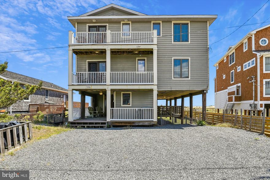 Prime Beachfront location at south end of South Bethany offers direct access to State Park south of town, which offers year round fishing, pet friendly beach and long unobstructed views.  Excellent Rental potential established over many years grossing $87,885.00 in 2023.  This home was booked solid from June 10th through Sep 9th, the 13 weeks Sellers offered for rent.  Is currently renting for the 2024 season as a last minute rental listing at $8500/wk for prime weeks (just opened for rentals this 6/3).
Enjoy this coastal retreat located in South Bethany, a family friendly quiet beach resort, just a mile and a half from the Bethany boardwalk & it's amenities, but only 1 block from shops & eateries in the York Beach Mall at the south end of town.  
Enter this accommodating home from the lower level Ocean Front covered deck, protected from weather & perfect for outdoor dining, games and outside leisure activities on a rainy or hot sunny day.  The entry level offers ample storage for beach supplies and a spacious natural lighted laundry room.
The main level boasts an inviting open floor plan, integrating living room, dining room and kitchen, perfect for entertaining!  Windows abound offering a bright and airy beach feel with stunning views in all directions.  A dual set of French doors creates a seamless flow from LR & DR out to the main Ocean Front deck.  Enjoy the view down the State Park beach & the WWII submarine watching tower from the Kitchen sink window.
Two large guest bedrooms and a full bath are conveniently located off the great room on he main level, one with French doors to a west deck with views of the park and "people watching" on Ocean Drive.
Two sunlit primary suites complete with en-suite baths are featured on the upper level, spilling out to a large Ocean Front sun deck with elevated ocean views.
Come see the sunrise over the ocean waves while sipping your morning brew or watch the sunsetting from the west balconies and decks as you enjoy all the beach has to offer all day and night.  
2 Electic Storm Shutters on East wall main level over 2 Atrium French Doors leading to oceanfront deck.
